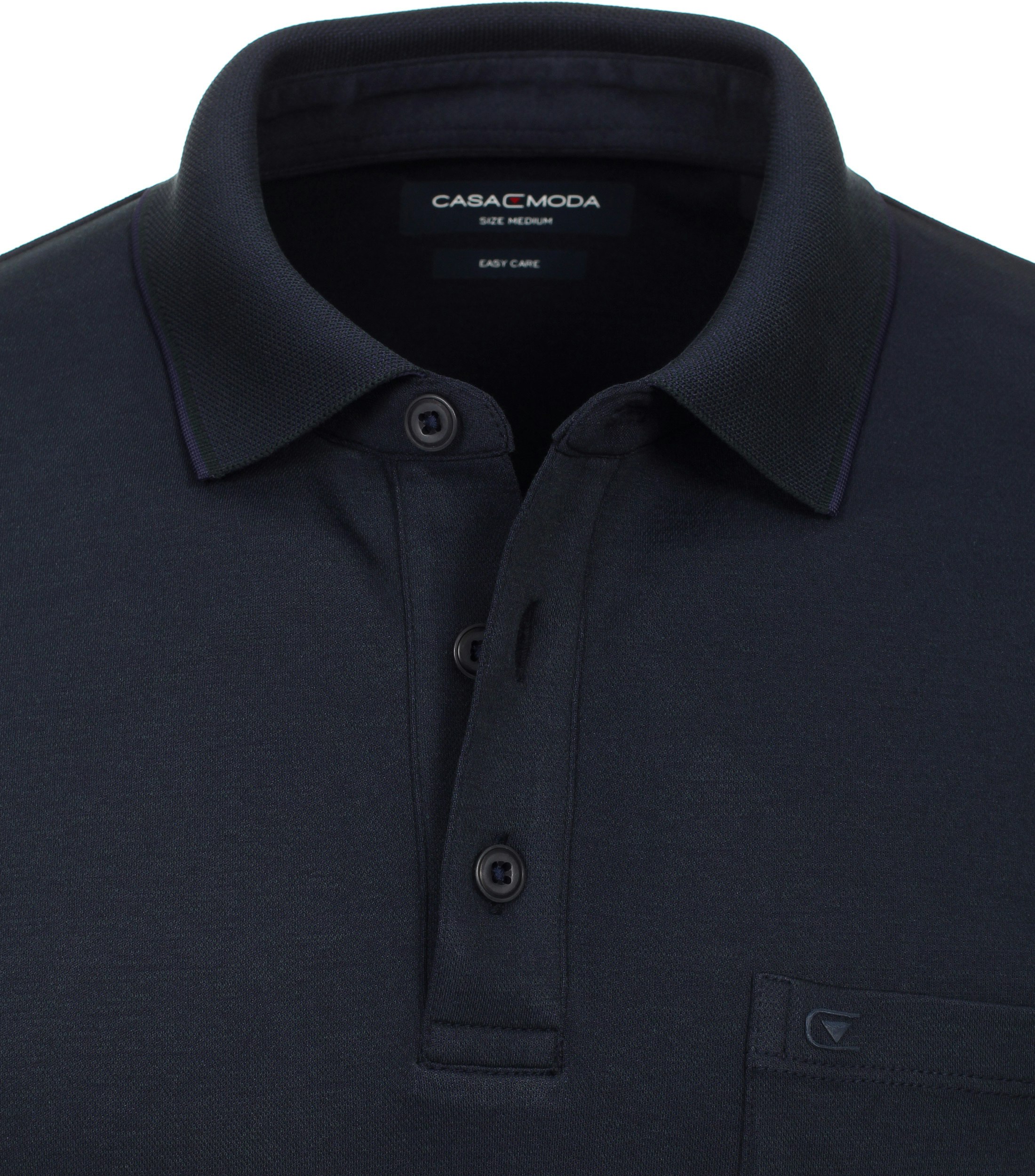 Ein Polo-Shirt im uni Muster in der Farbe Dunkelblau