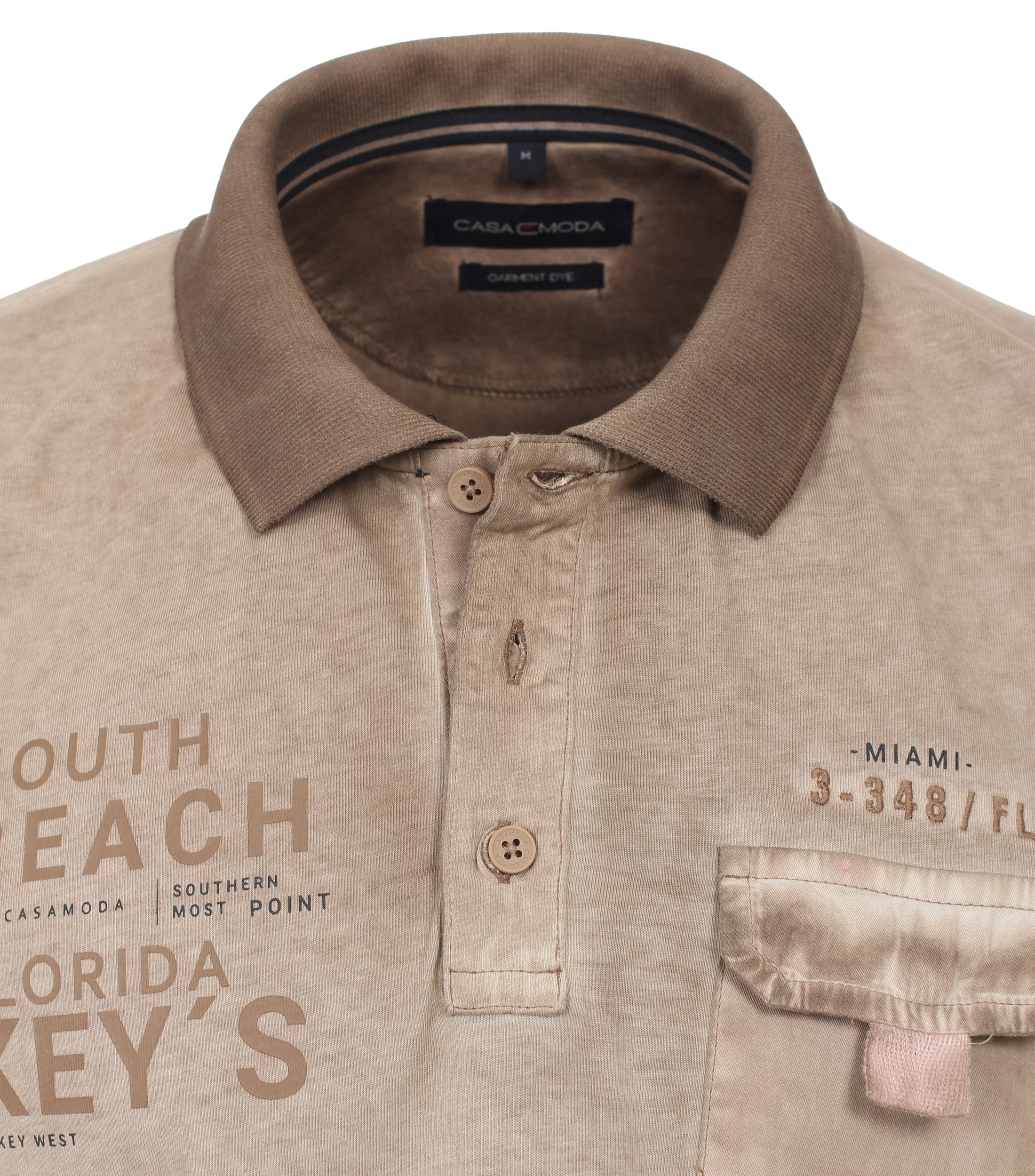 Ein Polo-Shirt im uni Muster in der Farbe Beige