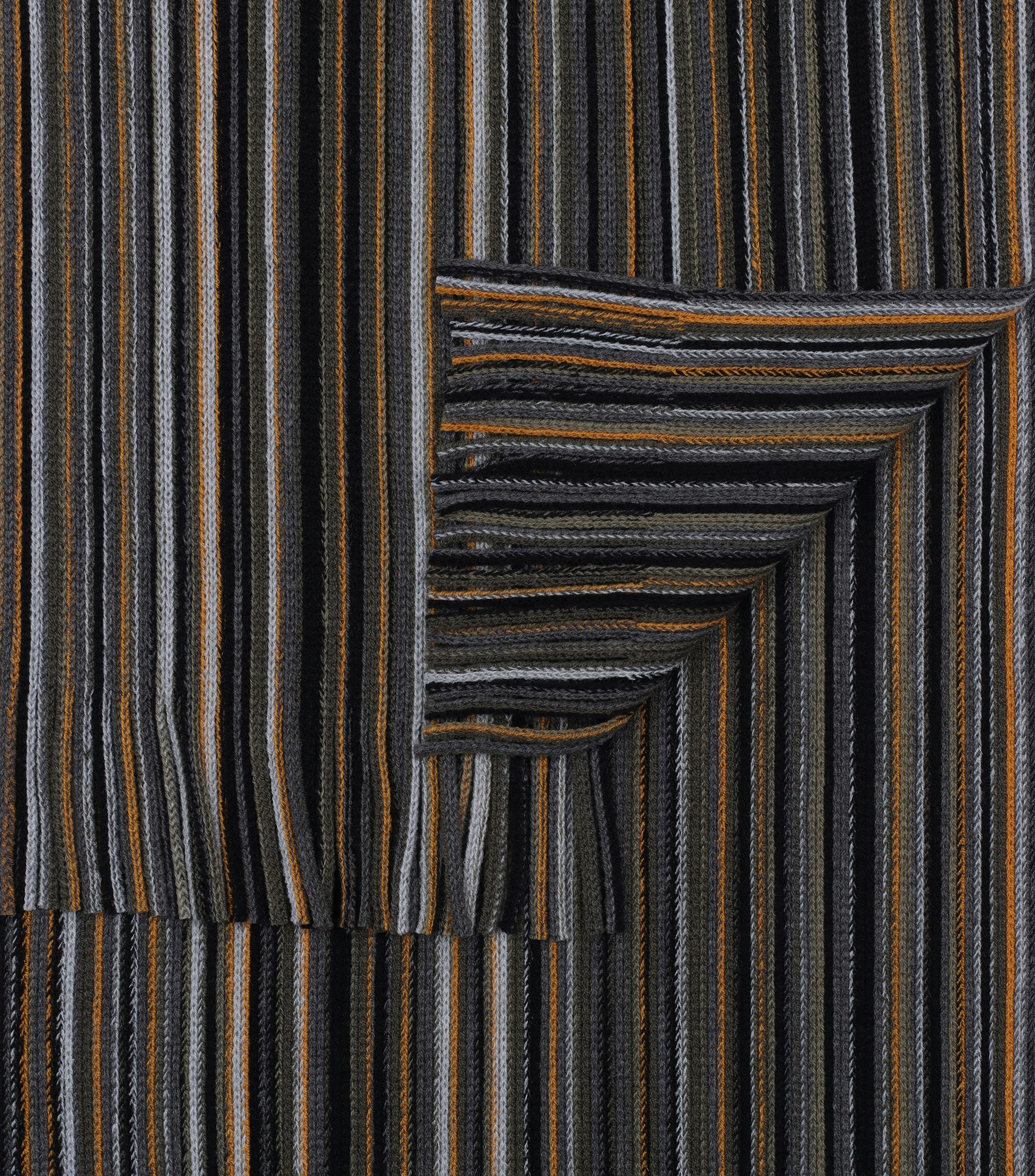 Ein Schal im uni Muster in der Farbe Gelb