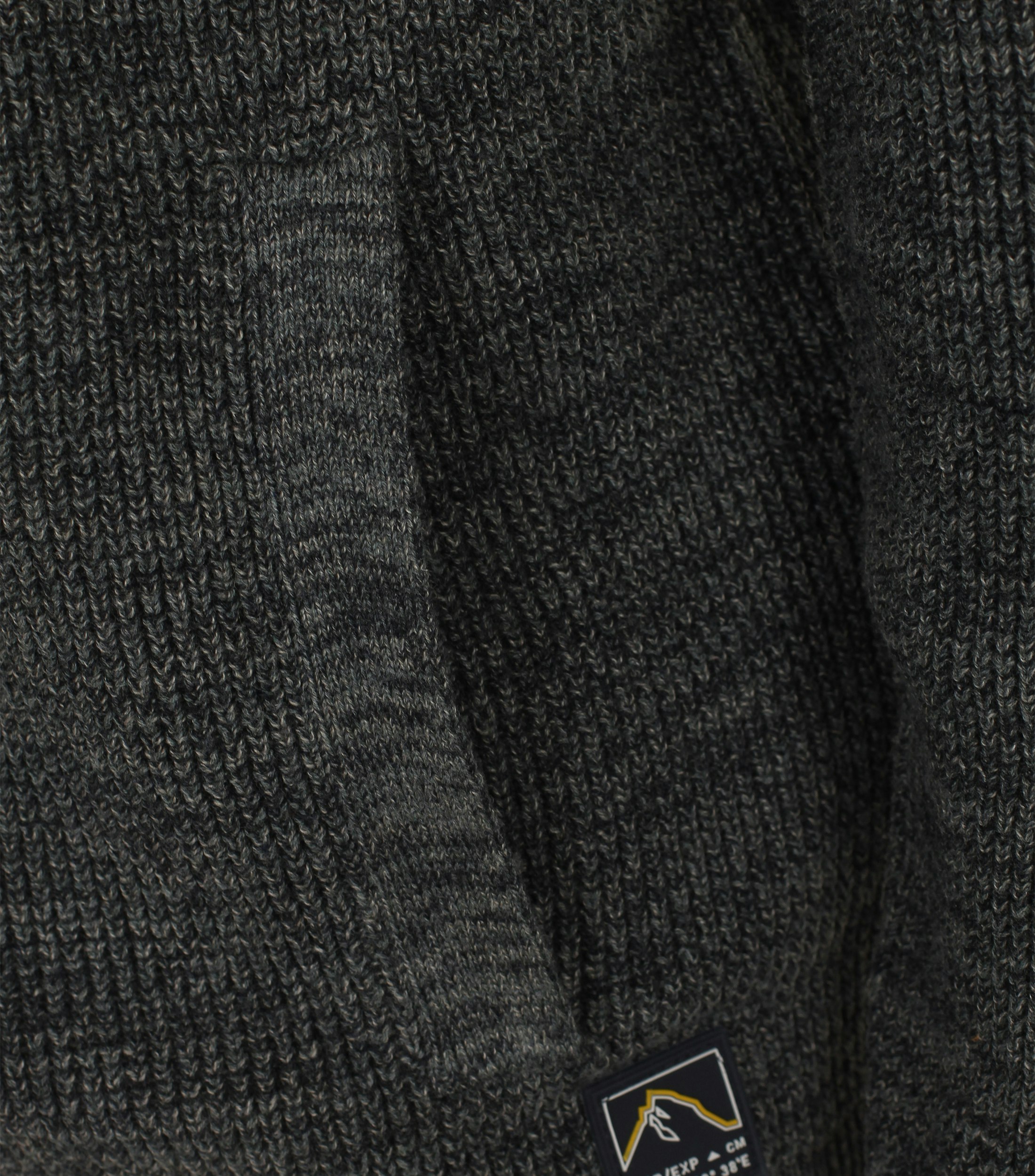 Ein Strickjacke im uni Muster in der Farbe Dunkelgrün