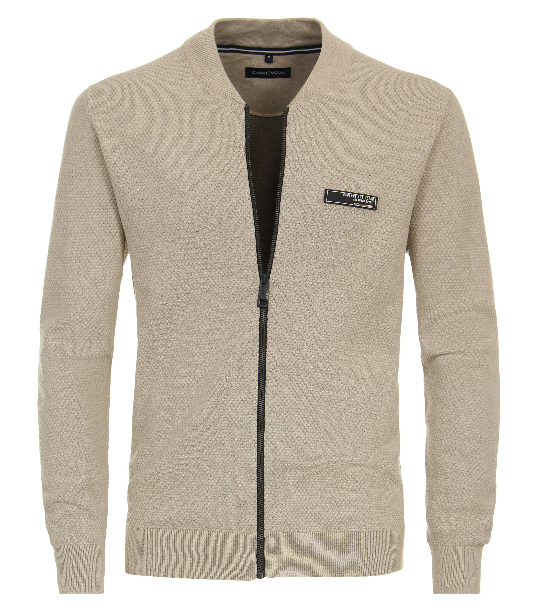 Ein Strickjacke im uni Muster in der Farbe Beige