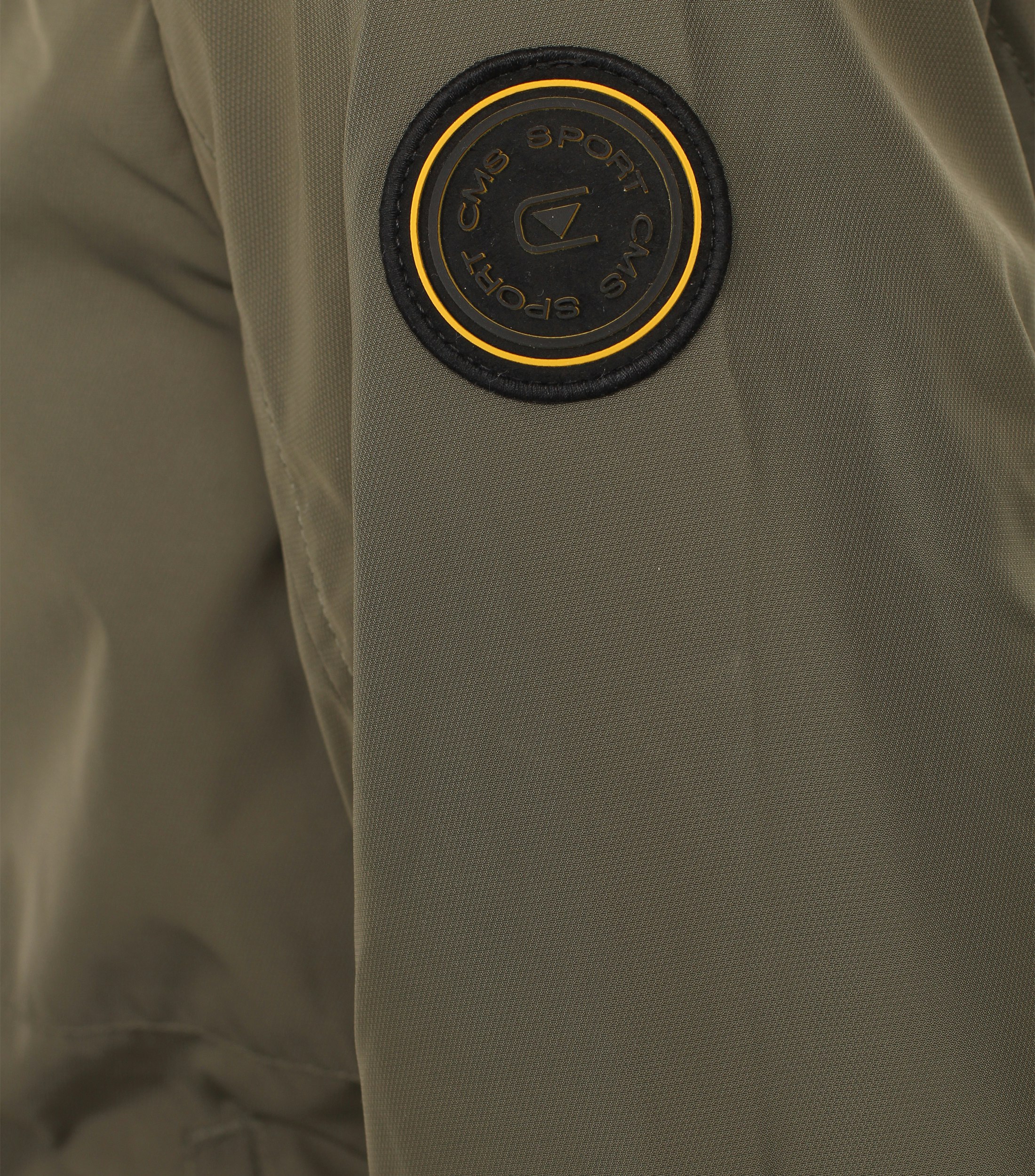 Ein Jacke im uni Muster in der Farbe Grün