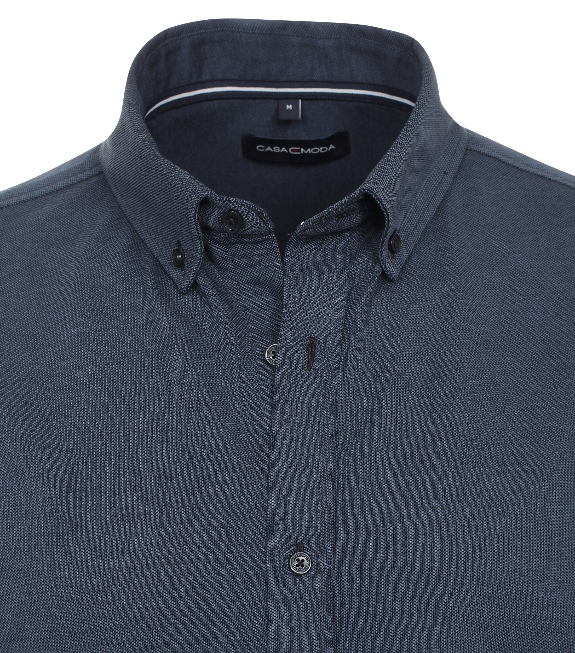 Ein Polo-Shirt im uni Muster in der Farbe Dunkelblau