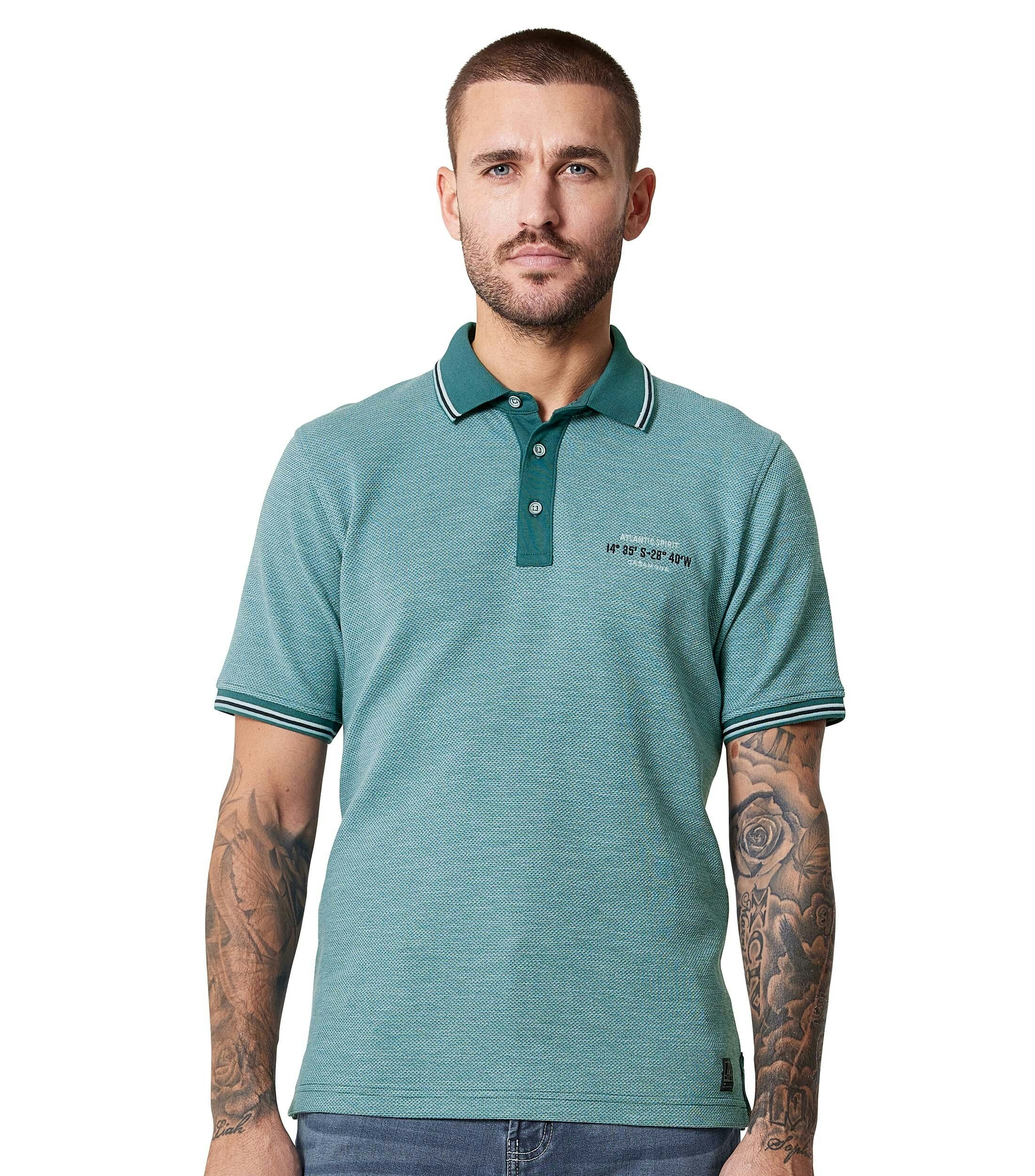 Ein Polo-Shirt im uni Muster in der Farbe Türkis