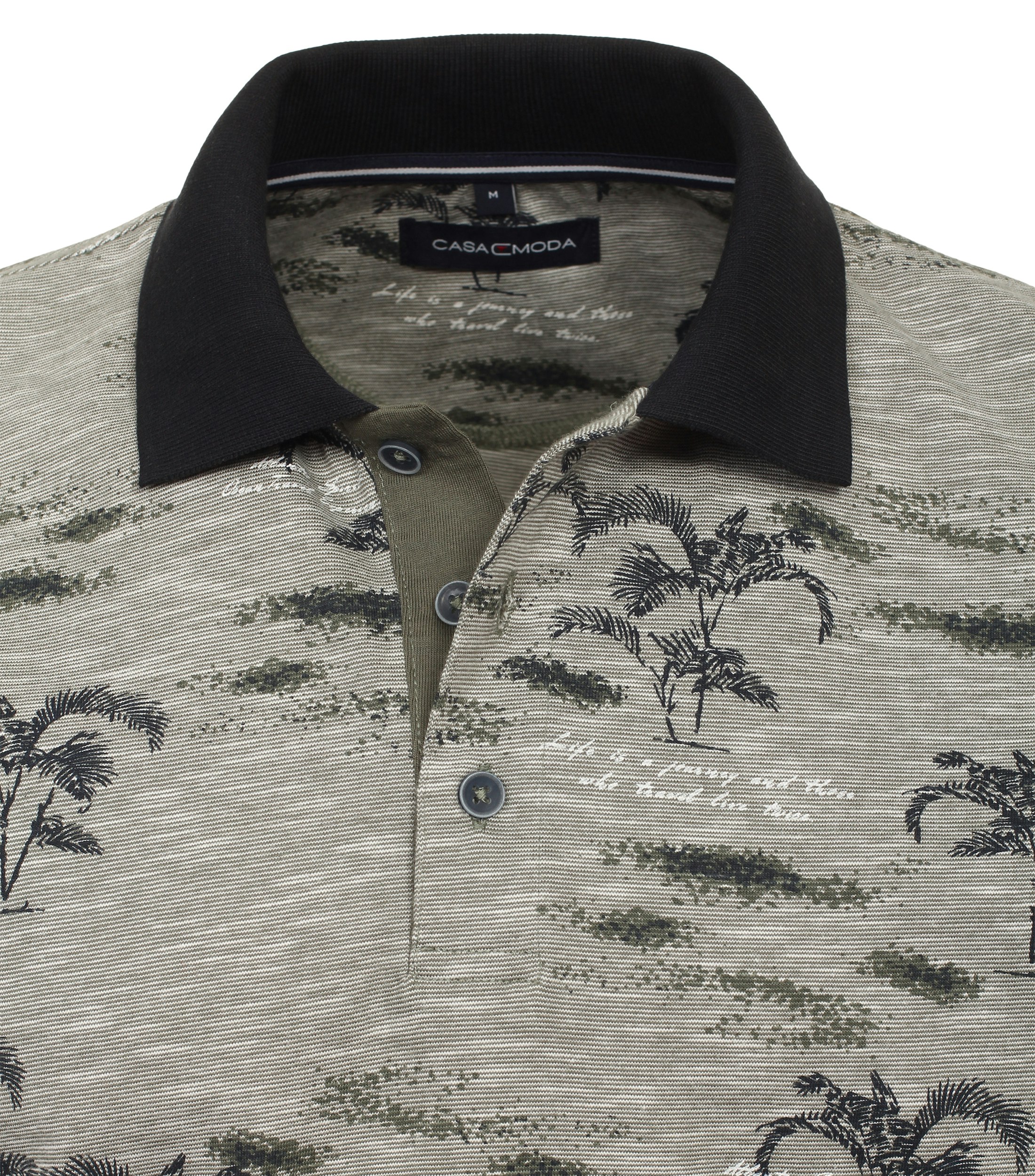Ein Polo-Shirt im Print Muster in der Farbe Hellgrün