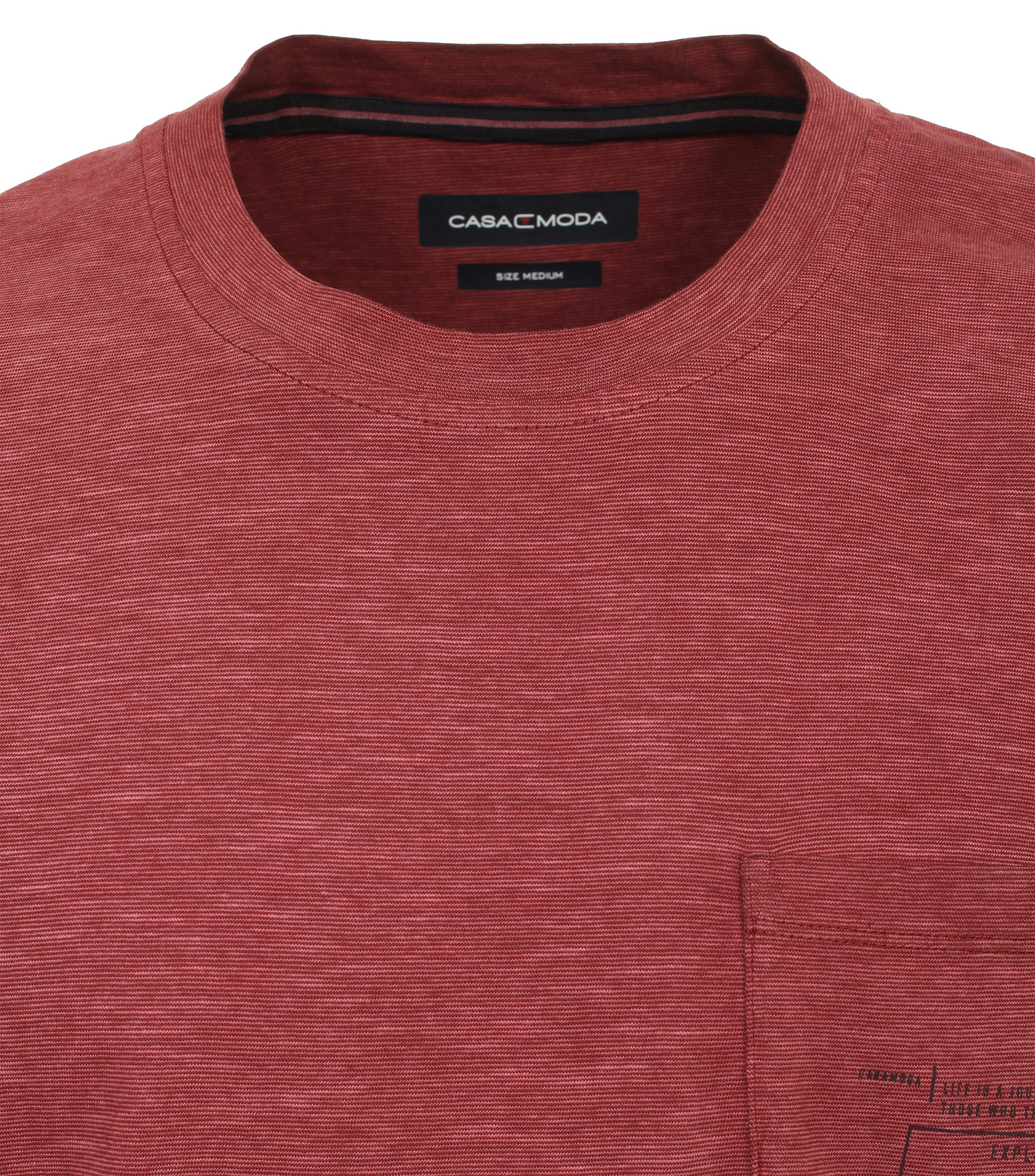 Ein T-Shirt im uni Muster in der Farbe Dunkelorange