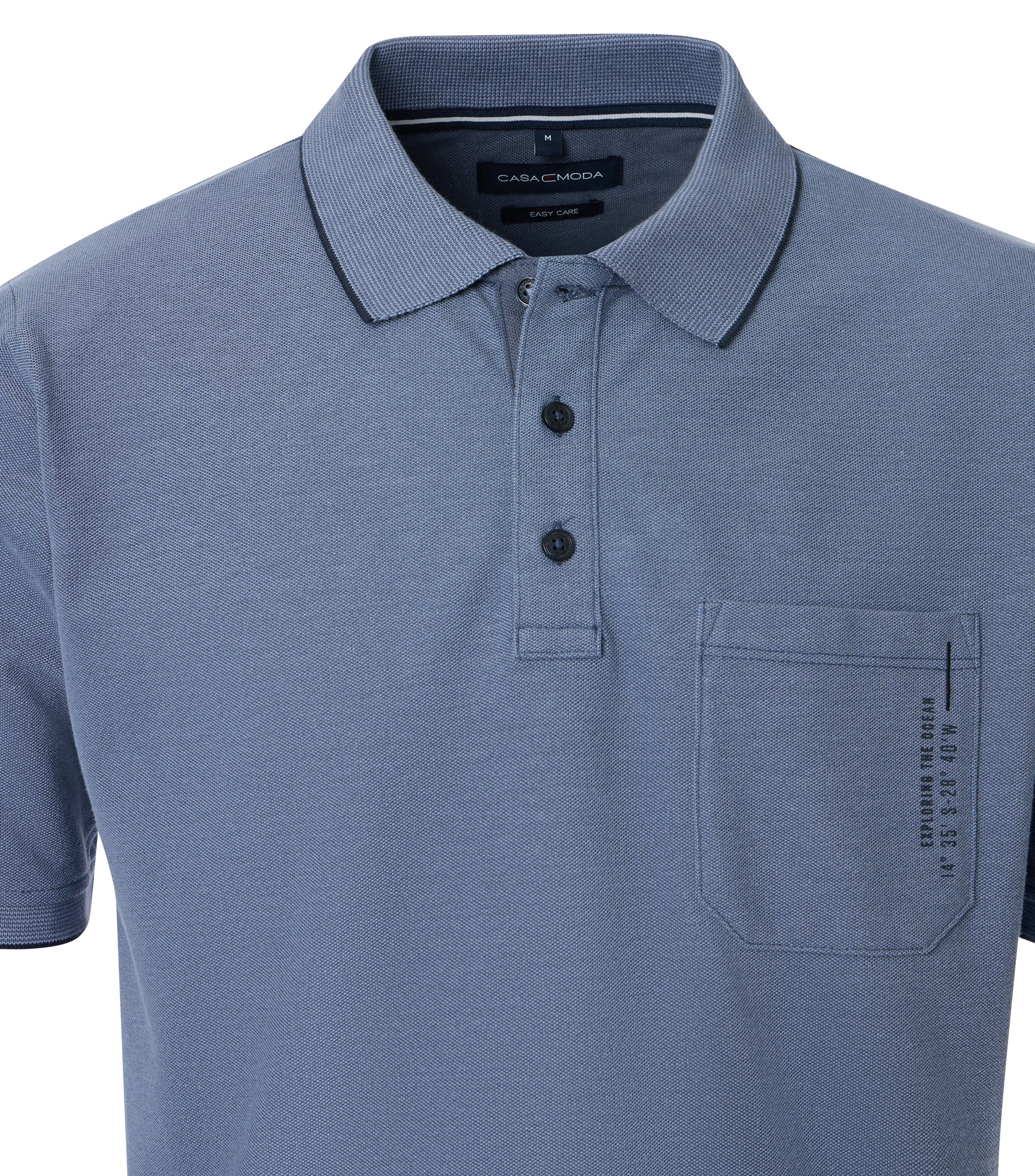 Ein Polo-Shirt im uni Muster in der Farbe Mittelblau