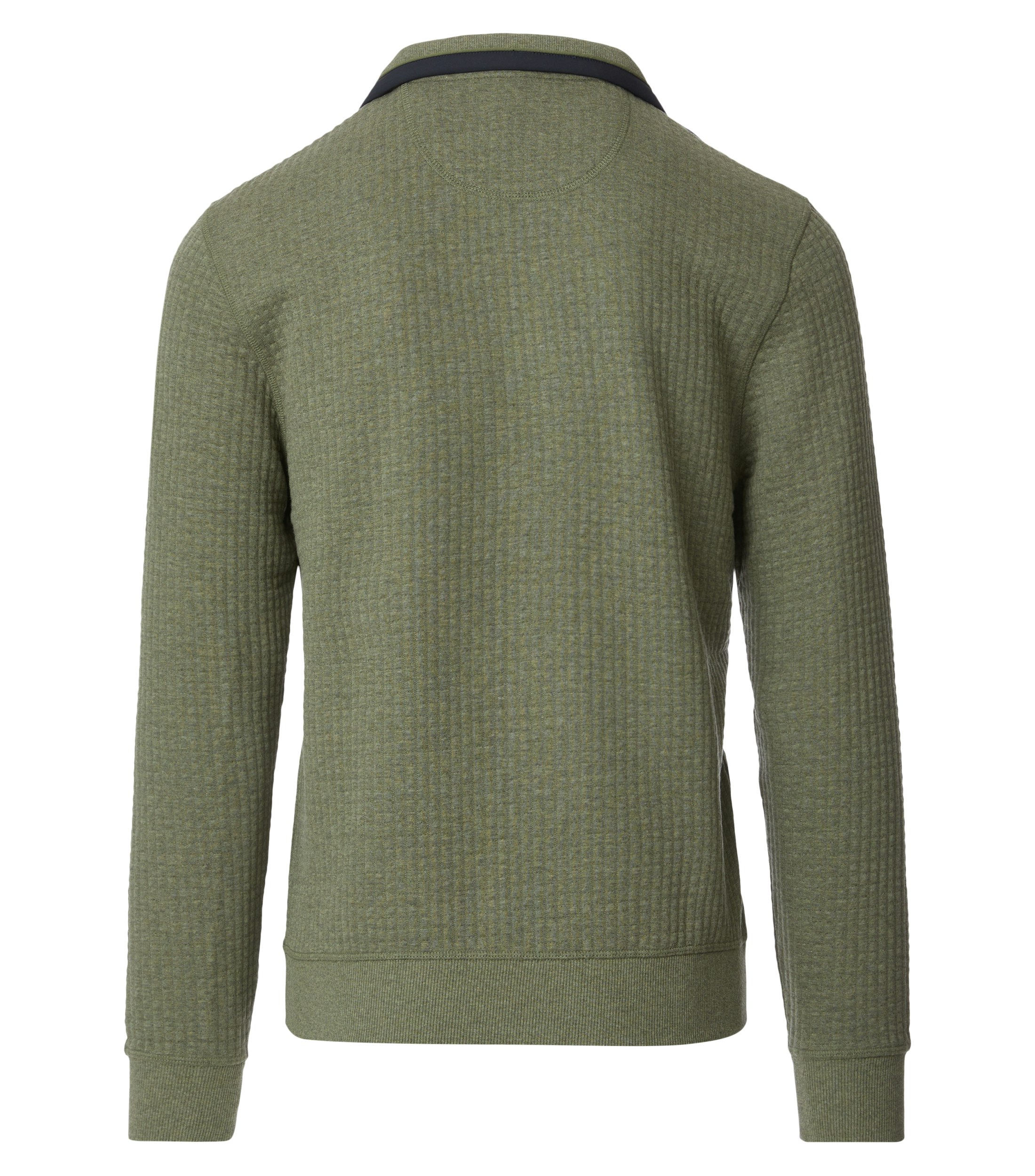Das Model trägt ein Sweatshirt im uni Muster in der Farbe Grün