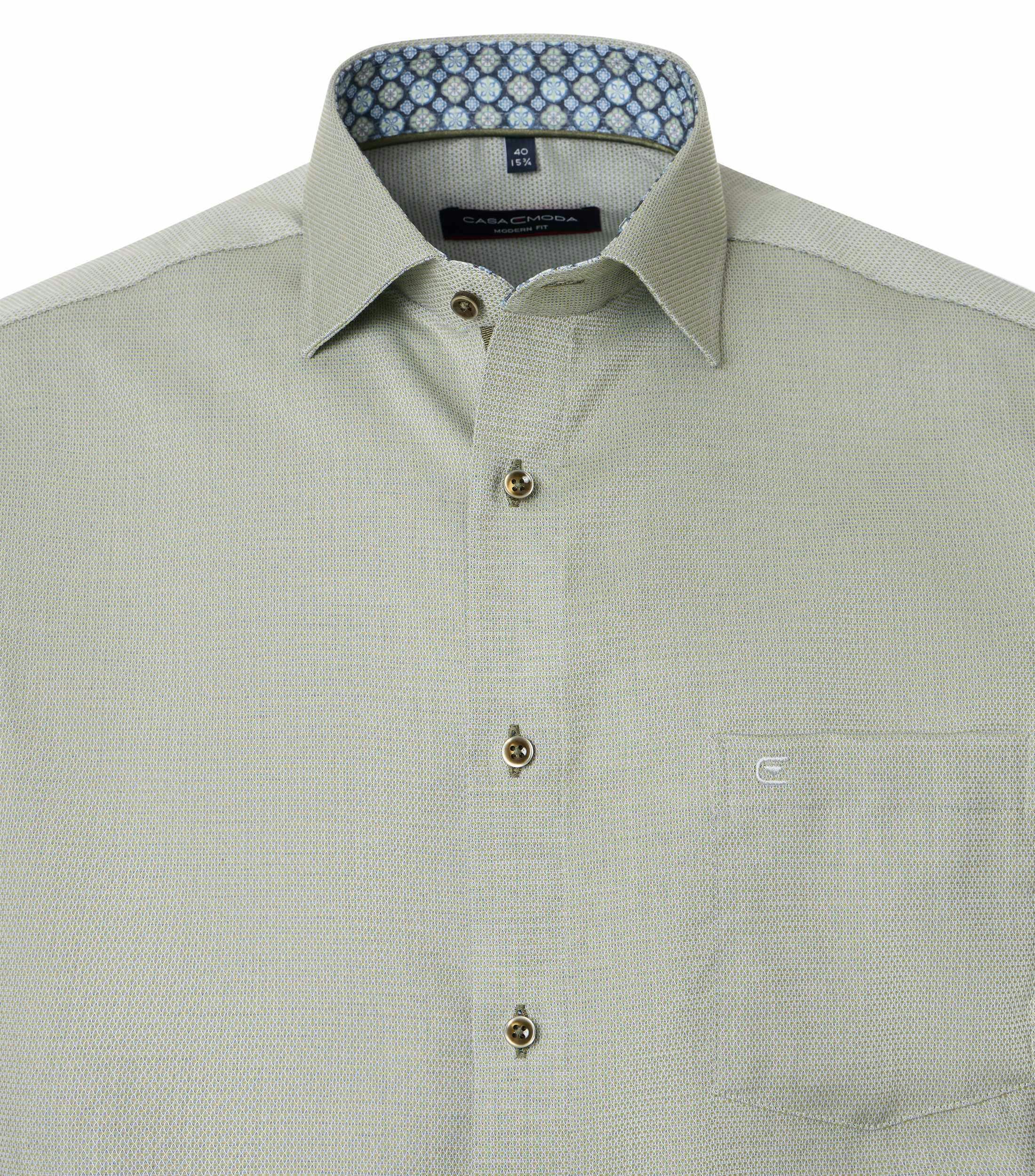 Ein Businesshemd im uni Muster in der Farbe Grün
