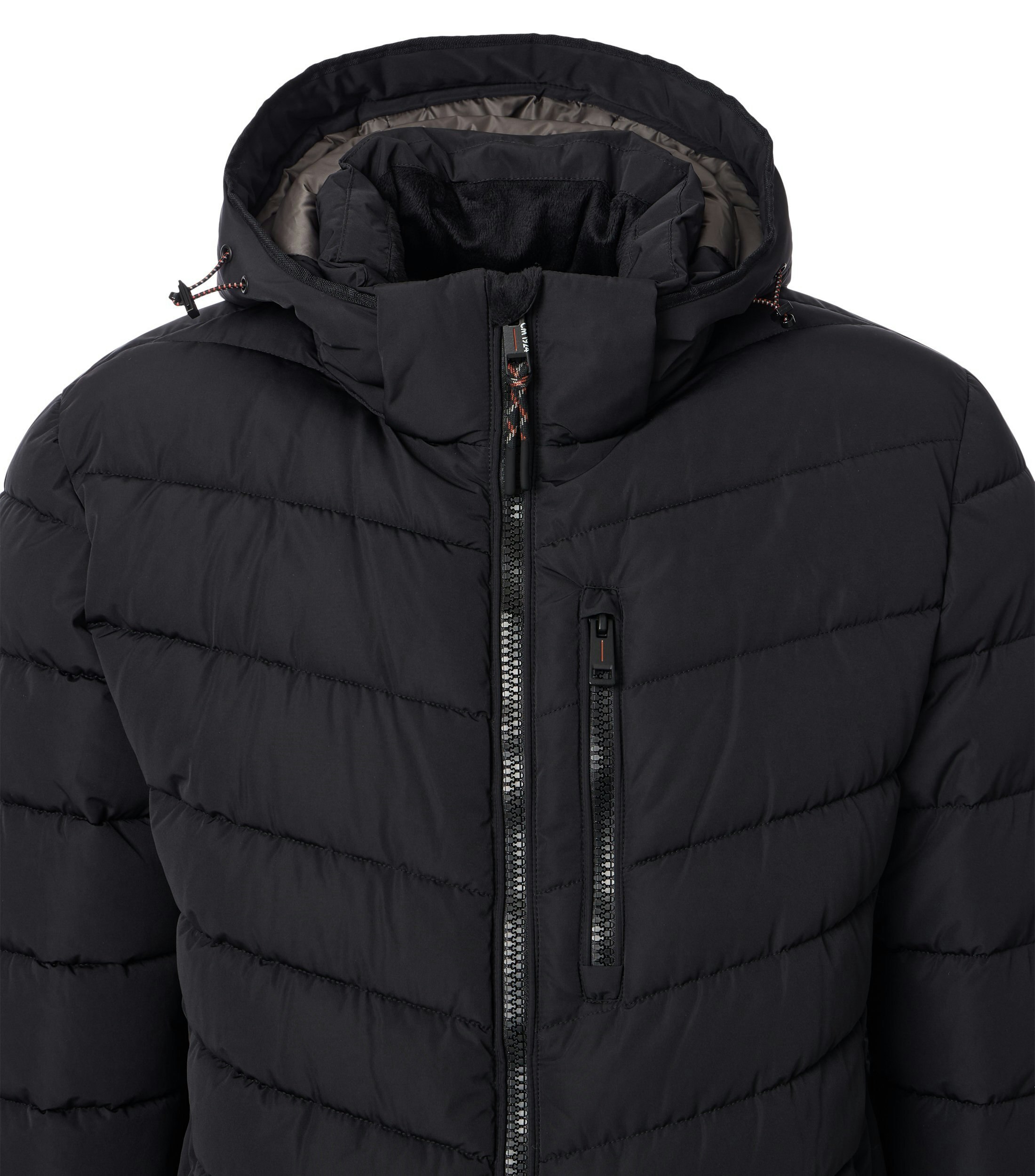 Das Model trägt eine Jacke im uni Muster in der Farbe Schwarz
