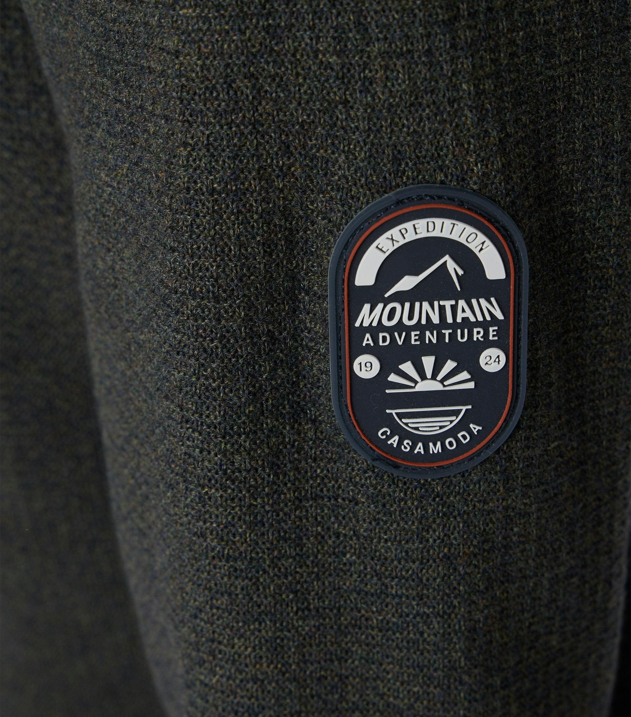 Ein Strickjacke im uni Muster in der Farbe Dunkelblau