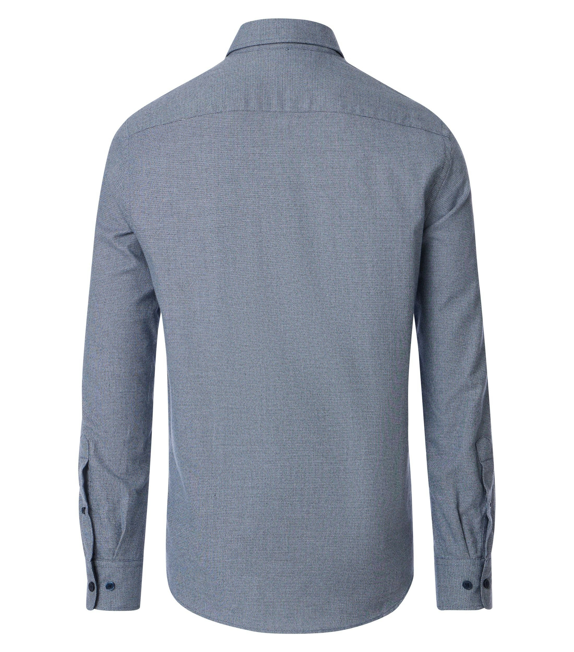 Ein Freizeithemd im uni Muster in der Farbe Blau