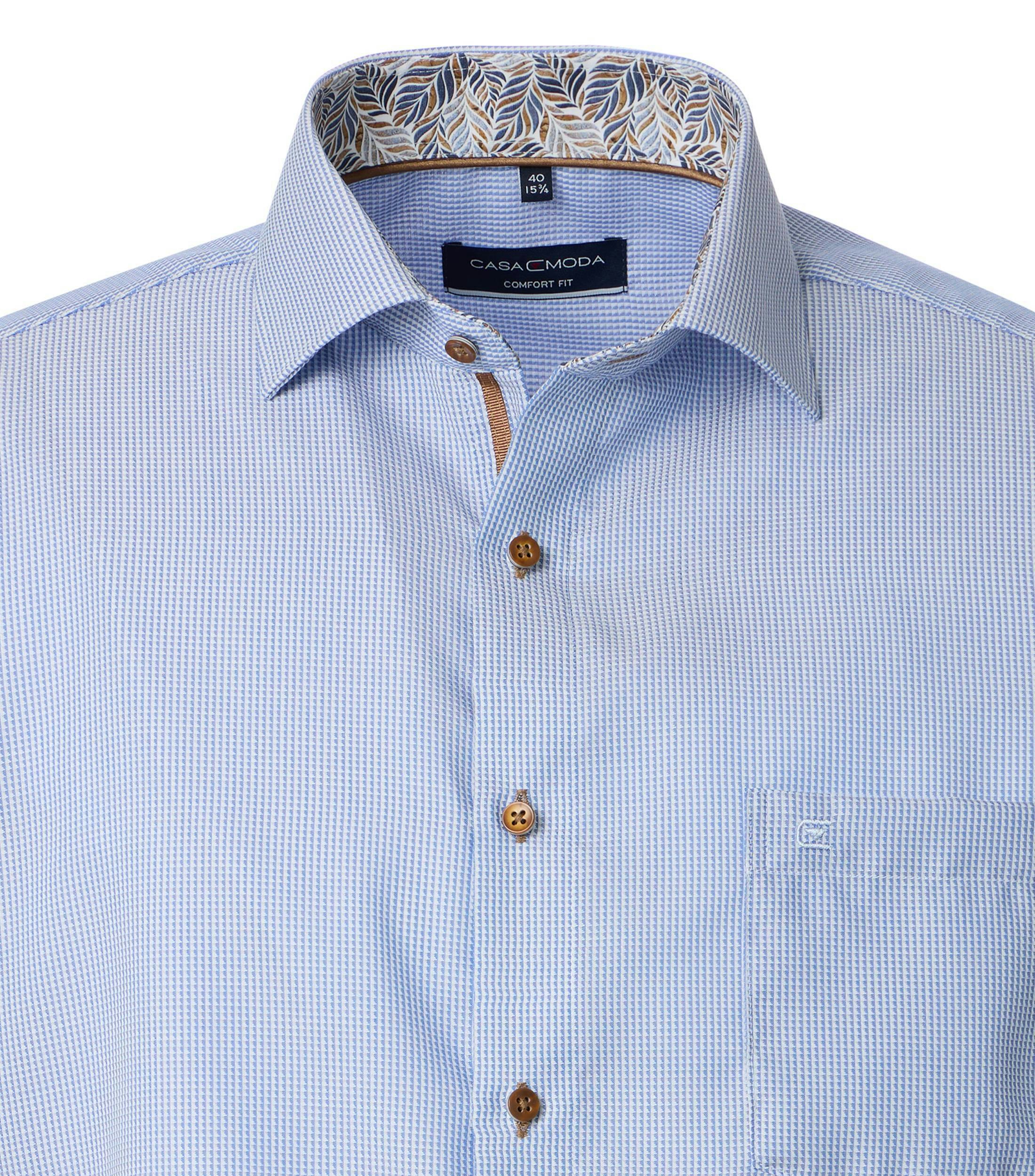 Ein Businesshemd im uni Muster in der Farbe Blau