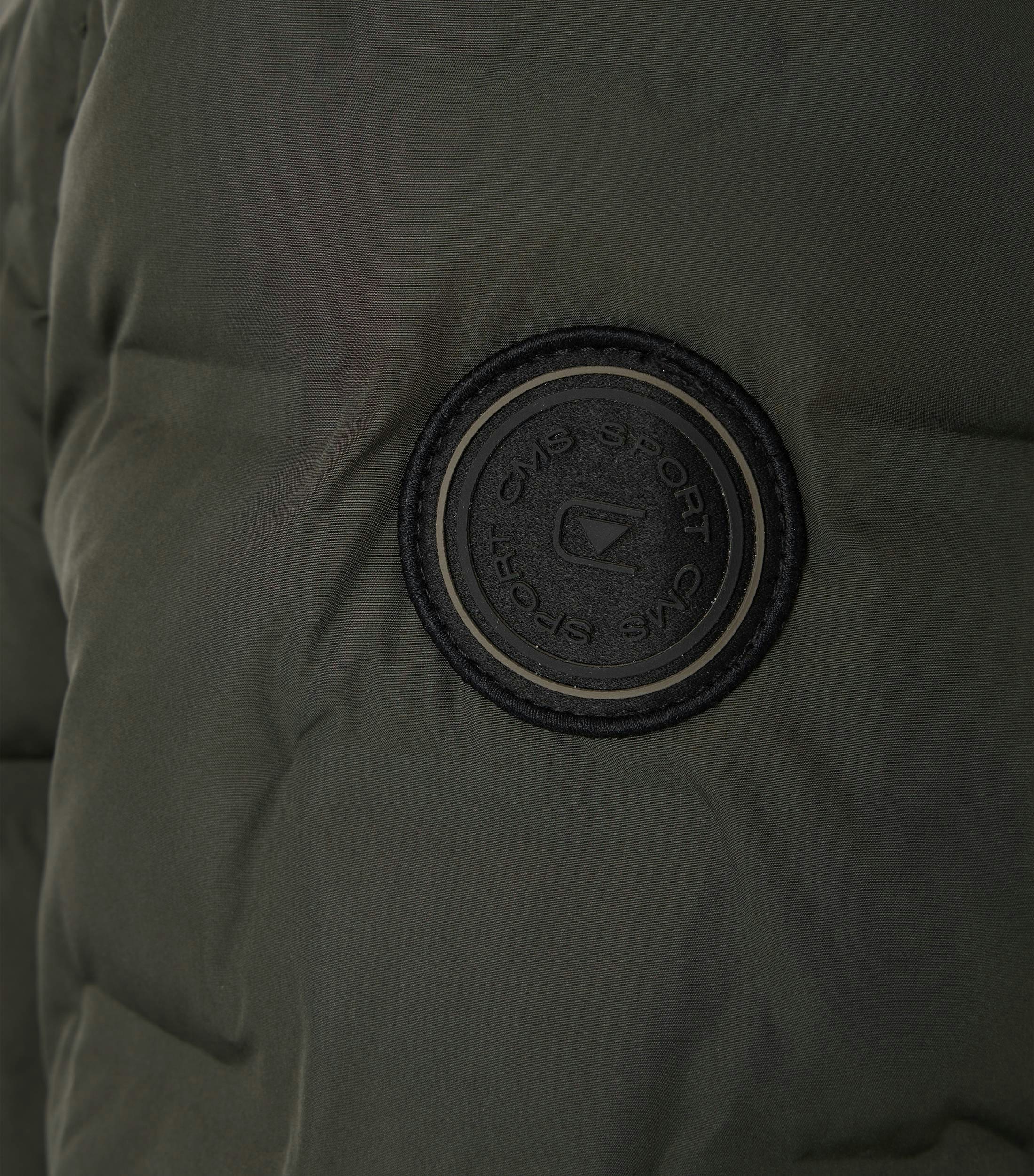 Ein Jacke im uni Muster in der Farbe Dunkelgrün