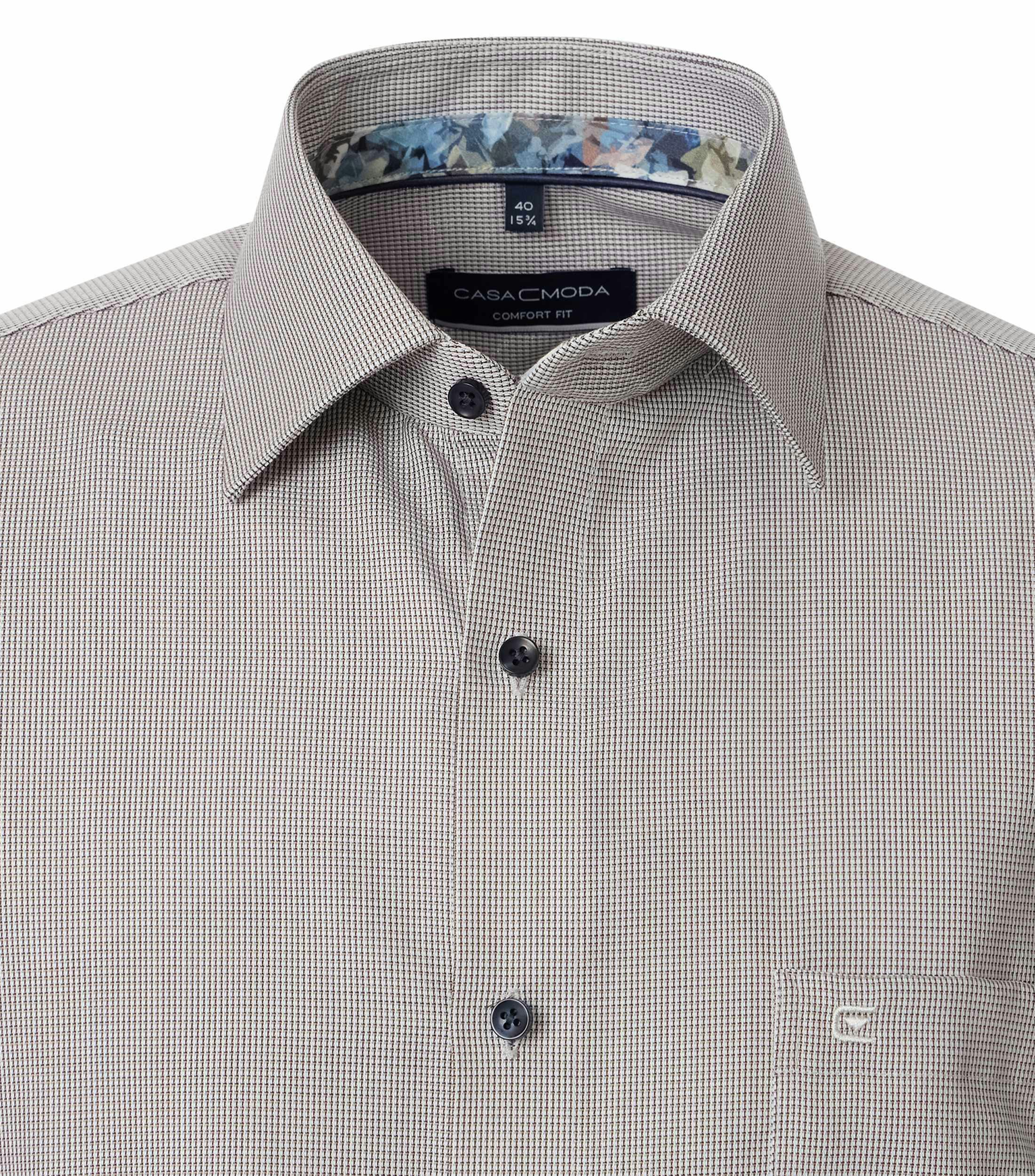 Ein Businesshemd im uni Muster in der Farbe Grau