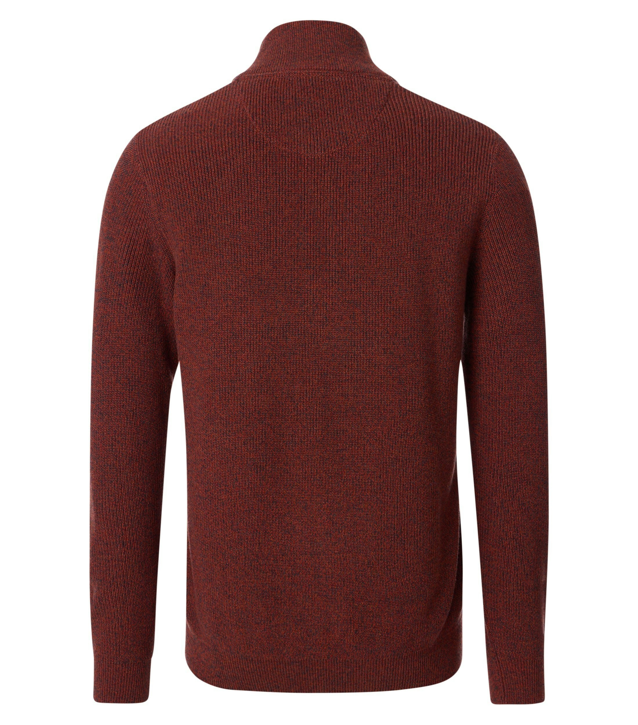 Das Model trägt ein Pullover im uni Muster in der Farbe Dunkelorange