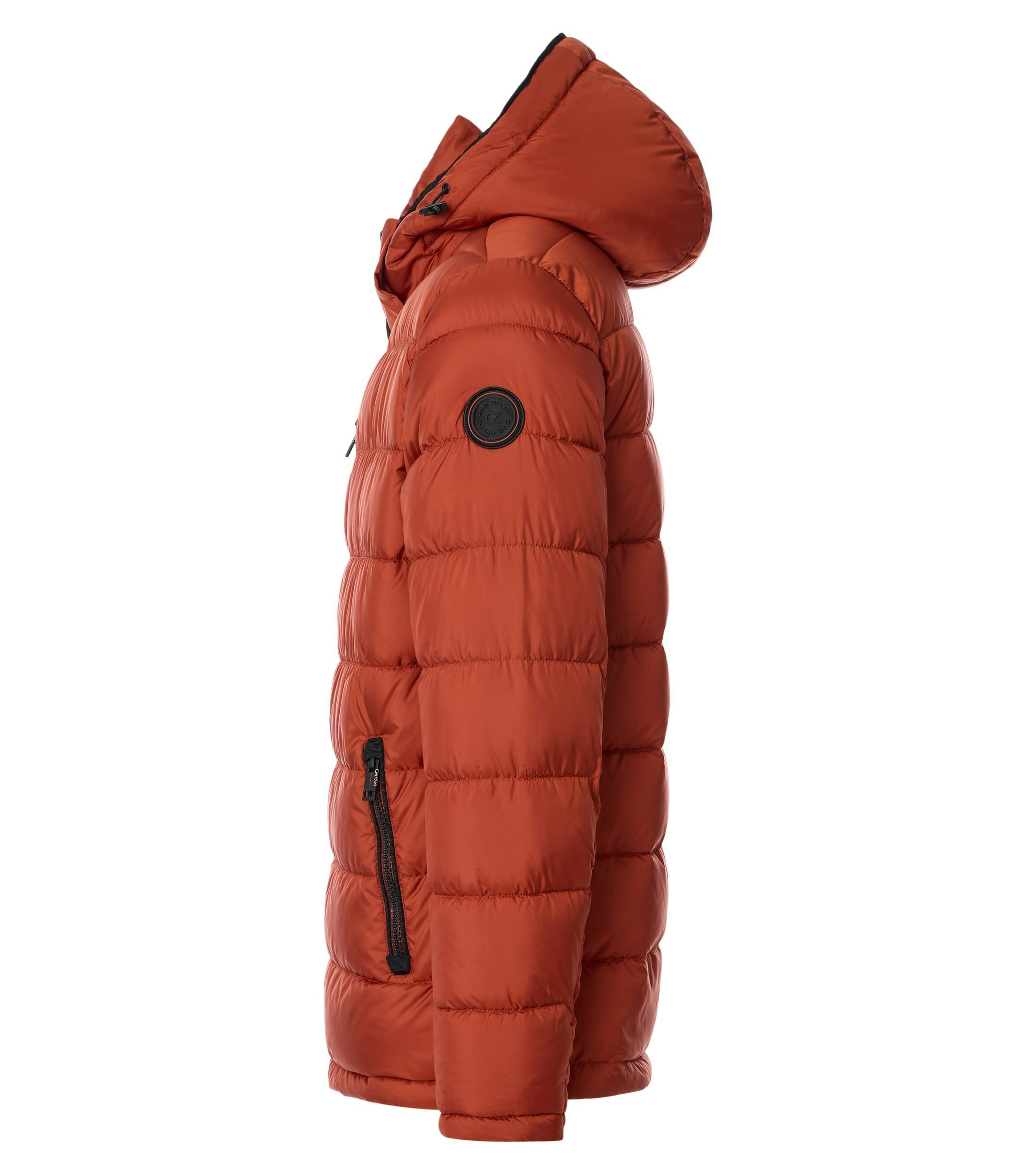 Das Model trägt eine Jacke im uni Muster in der Farbe Orange