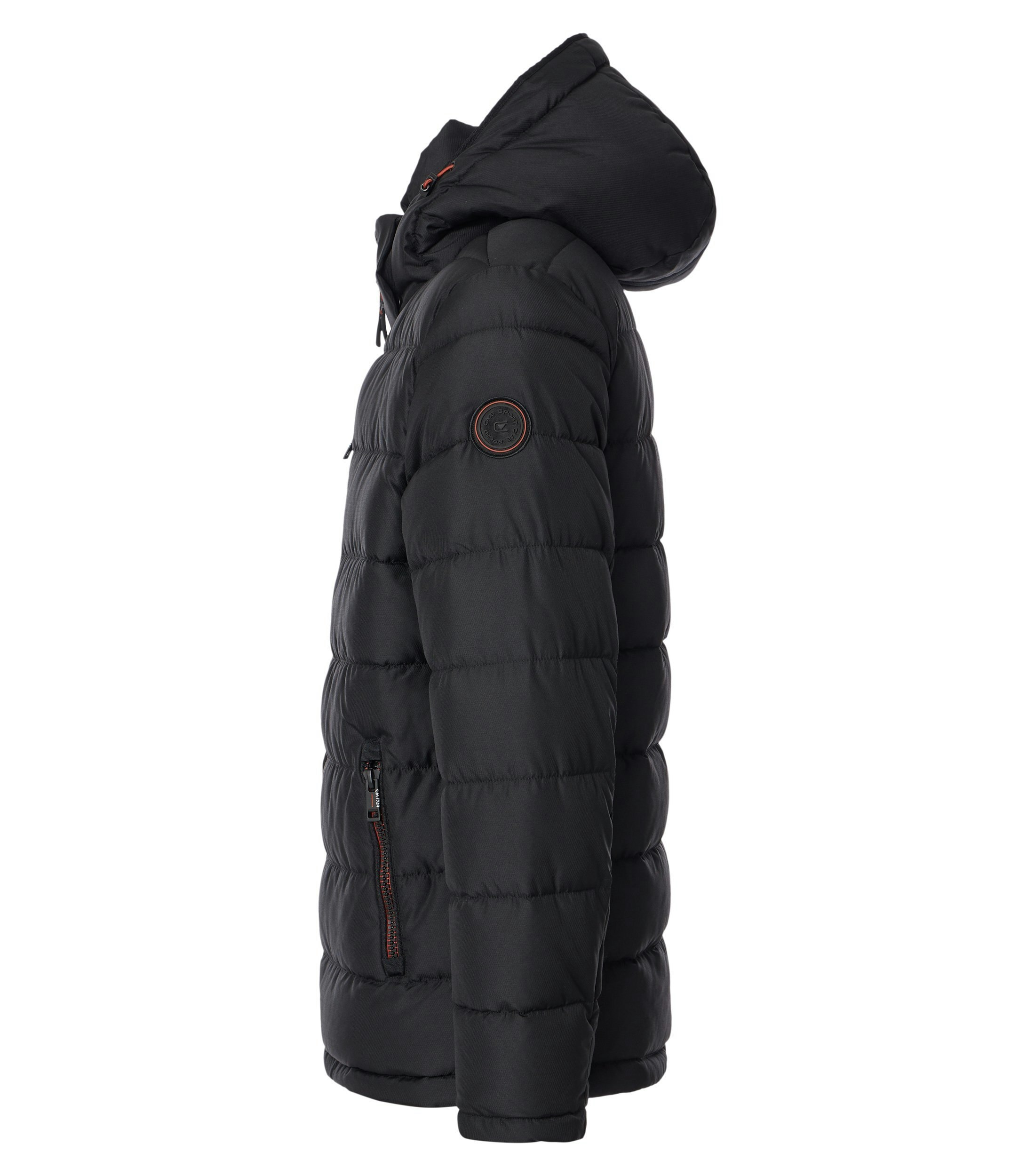 Das Model trägt eine Jacke im uni Muster in der Farbe Schwarz