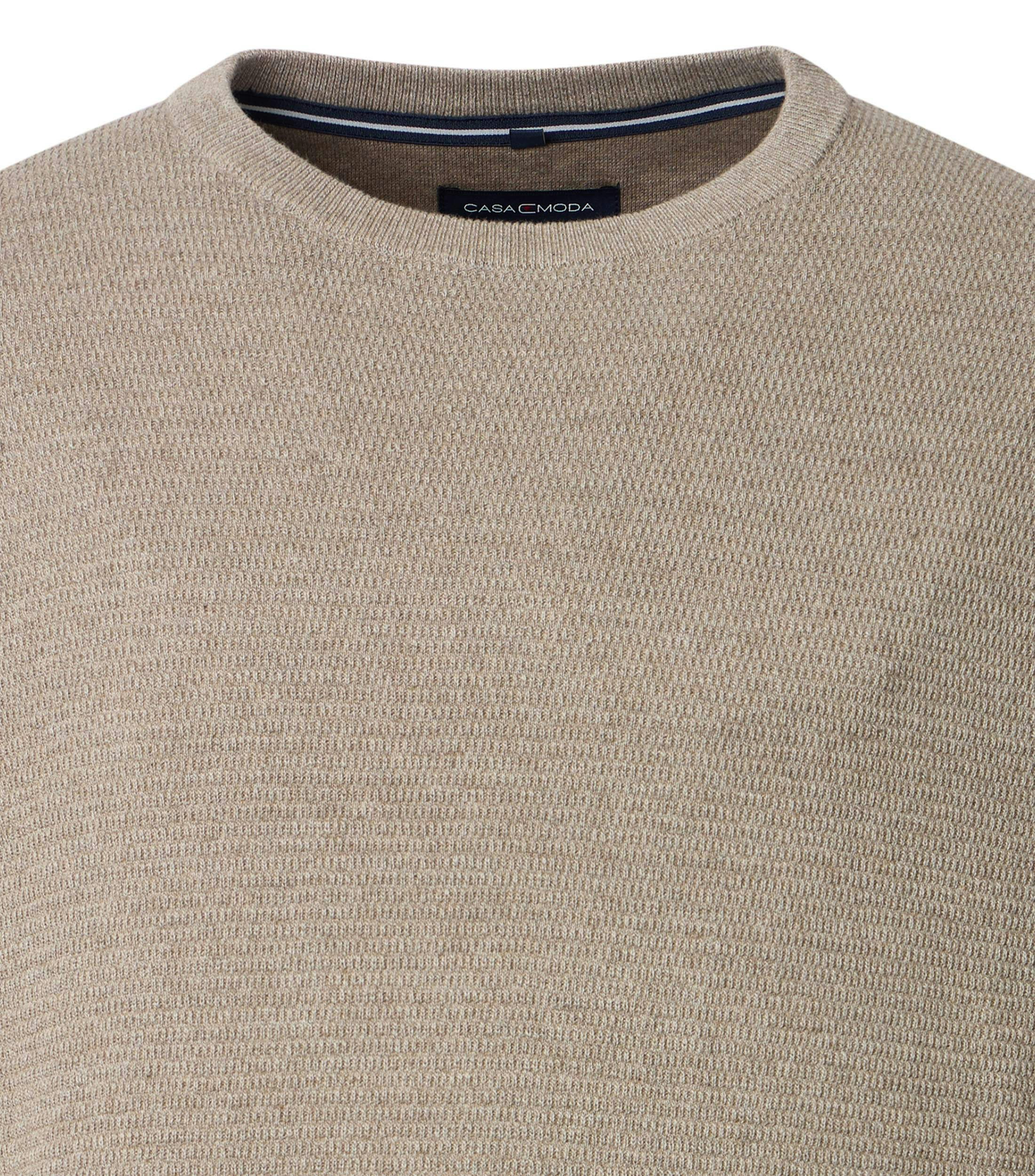 Ein Pullover im uni Muster in der Farbe Champagner Beige