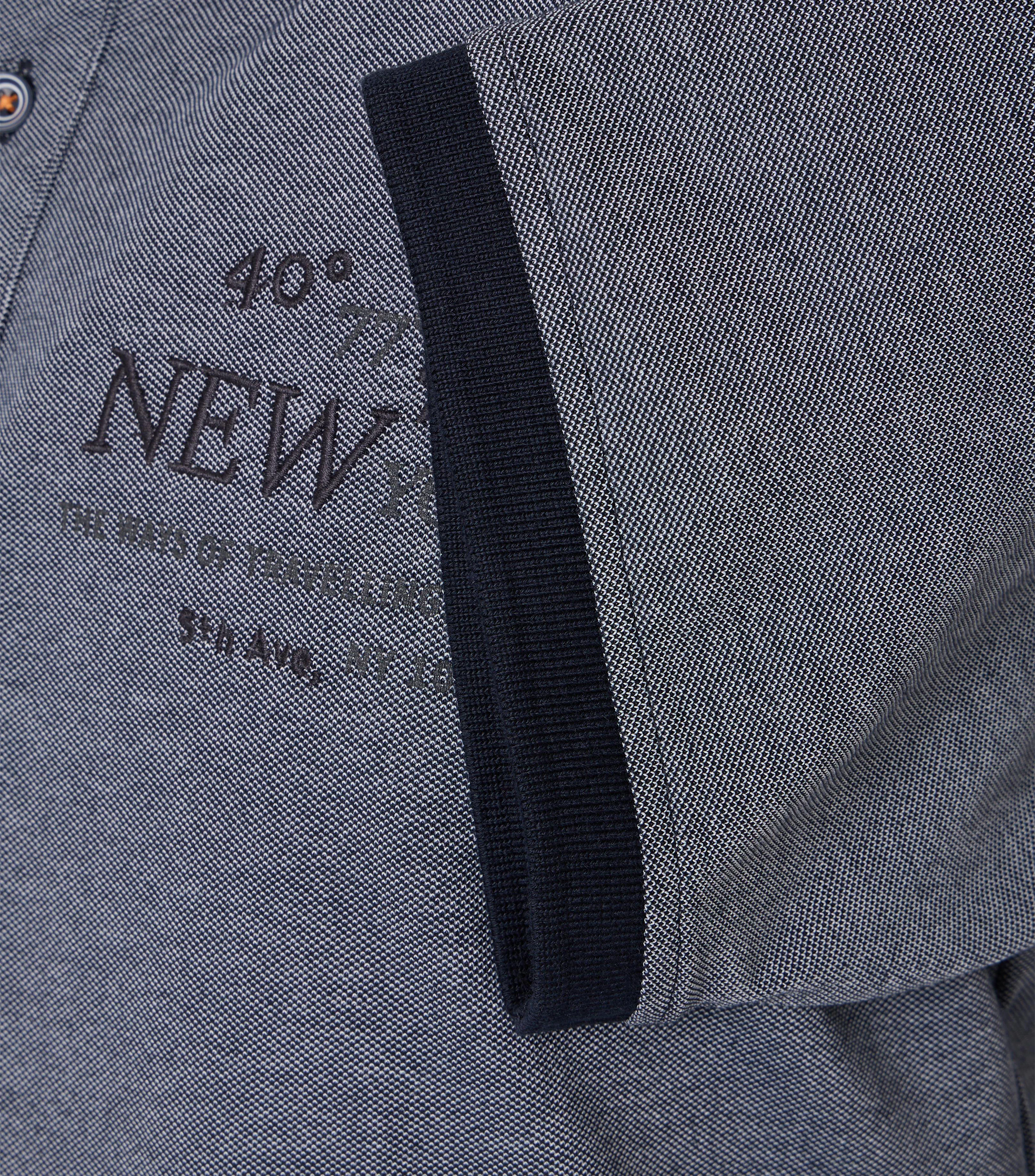 Polo-Shirt im Print-Muster in der Farbe Blau