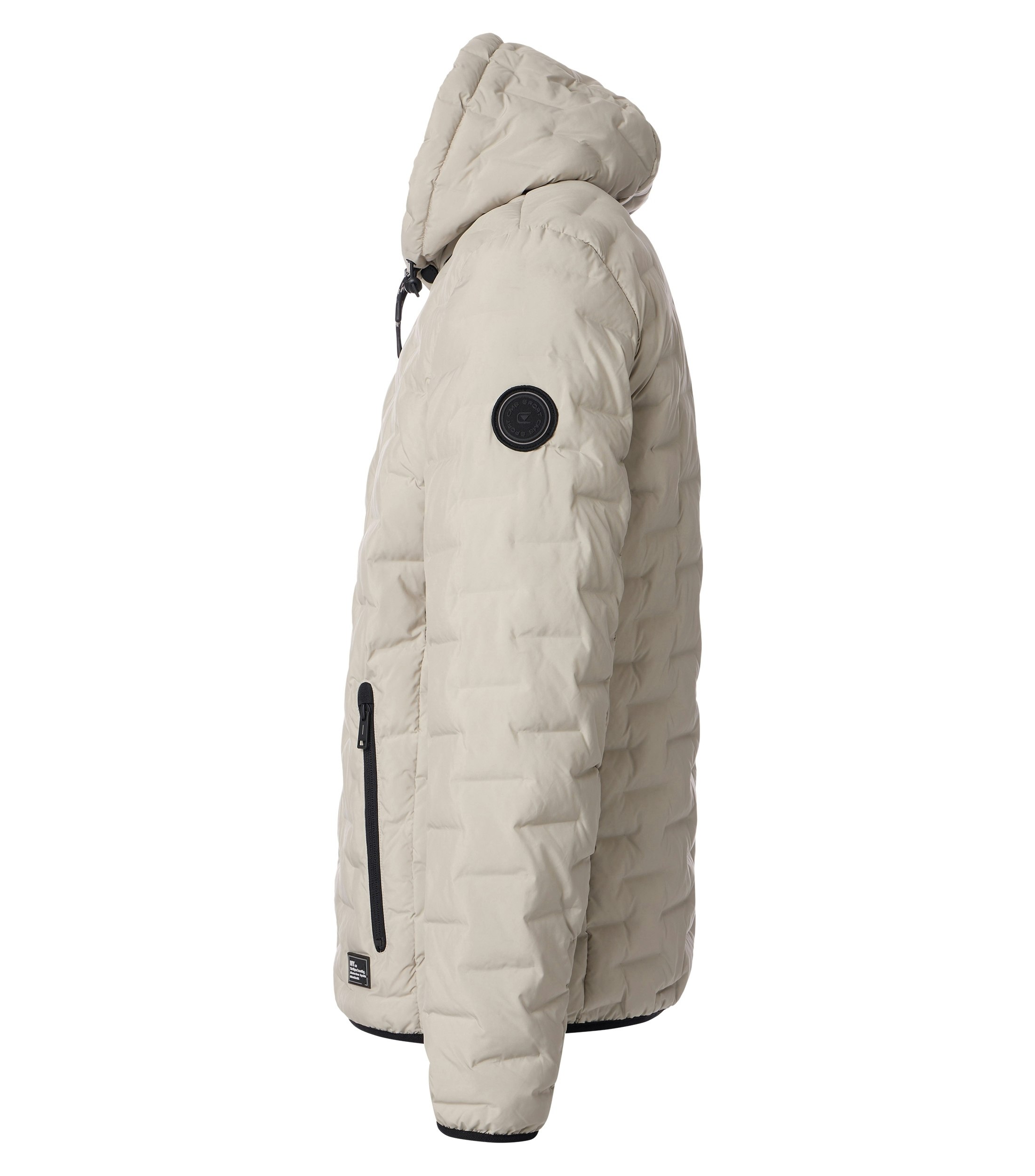 Das Model trägt eine Jacke im uni Muster in der Farbe Weißbeige