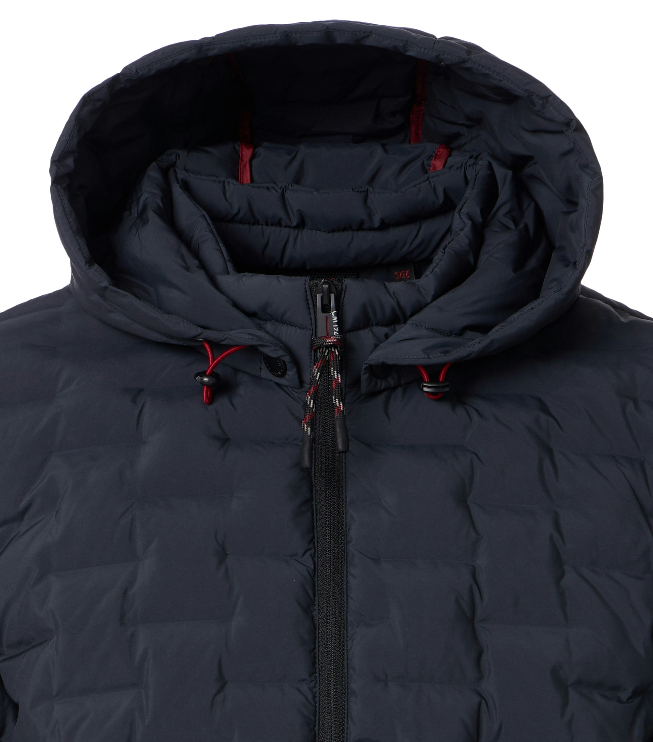 Das Model trägt eine Jacke im uni Muster in der Farbe Dunkelblau