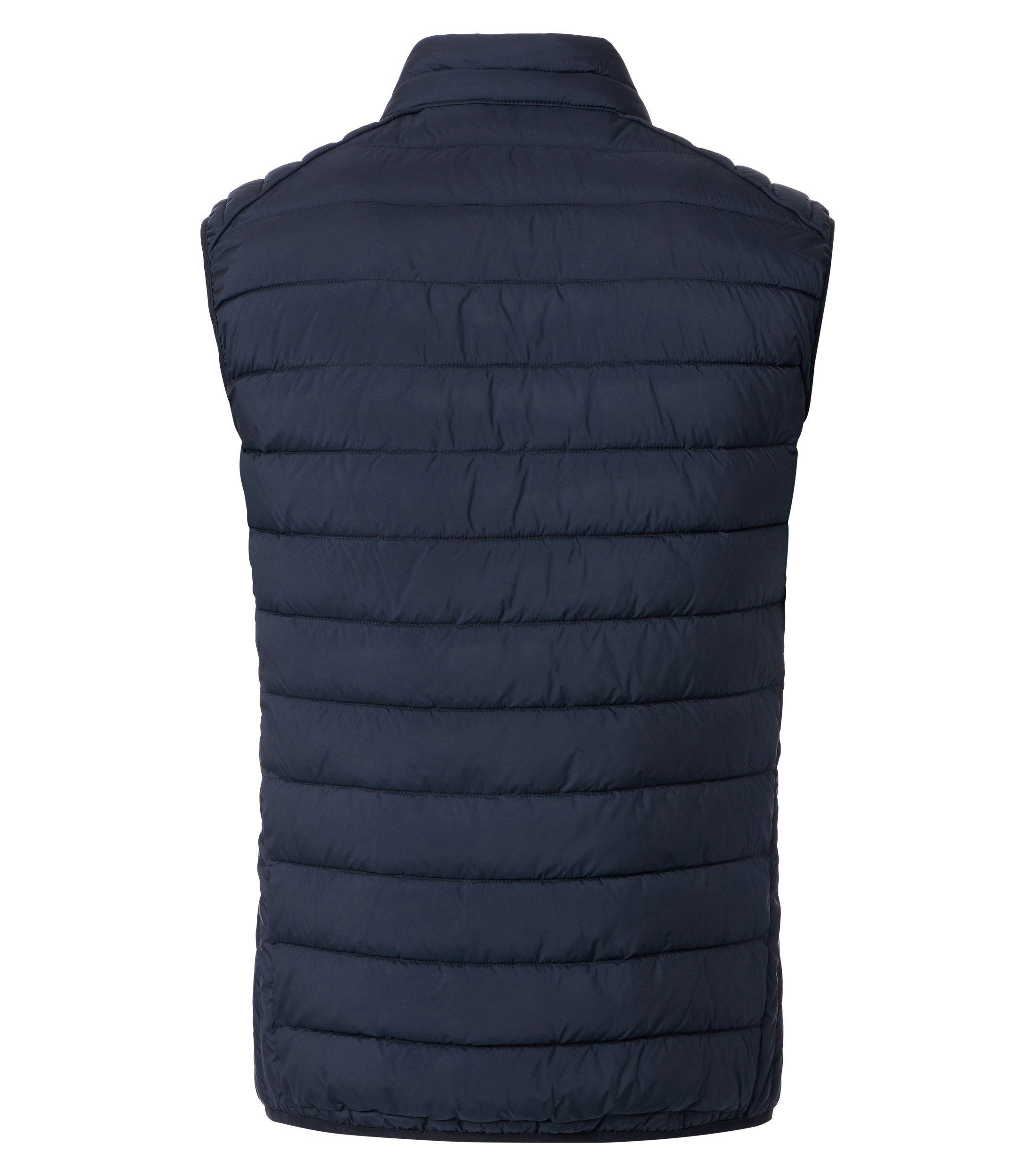 Das Model trägt eine Weste im uni Muster in der Farbe Dunkelblau