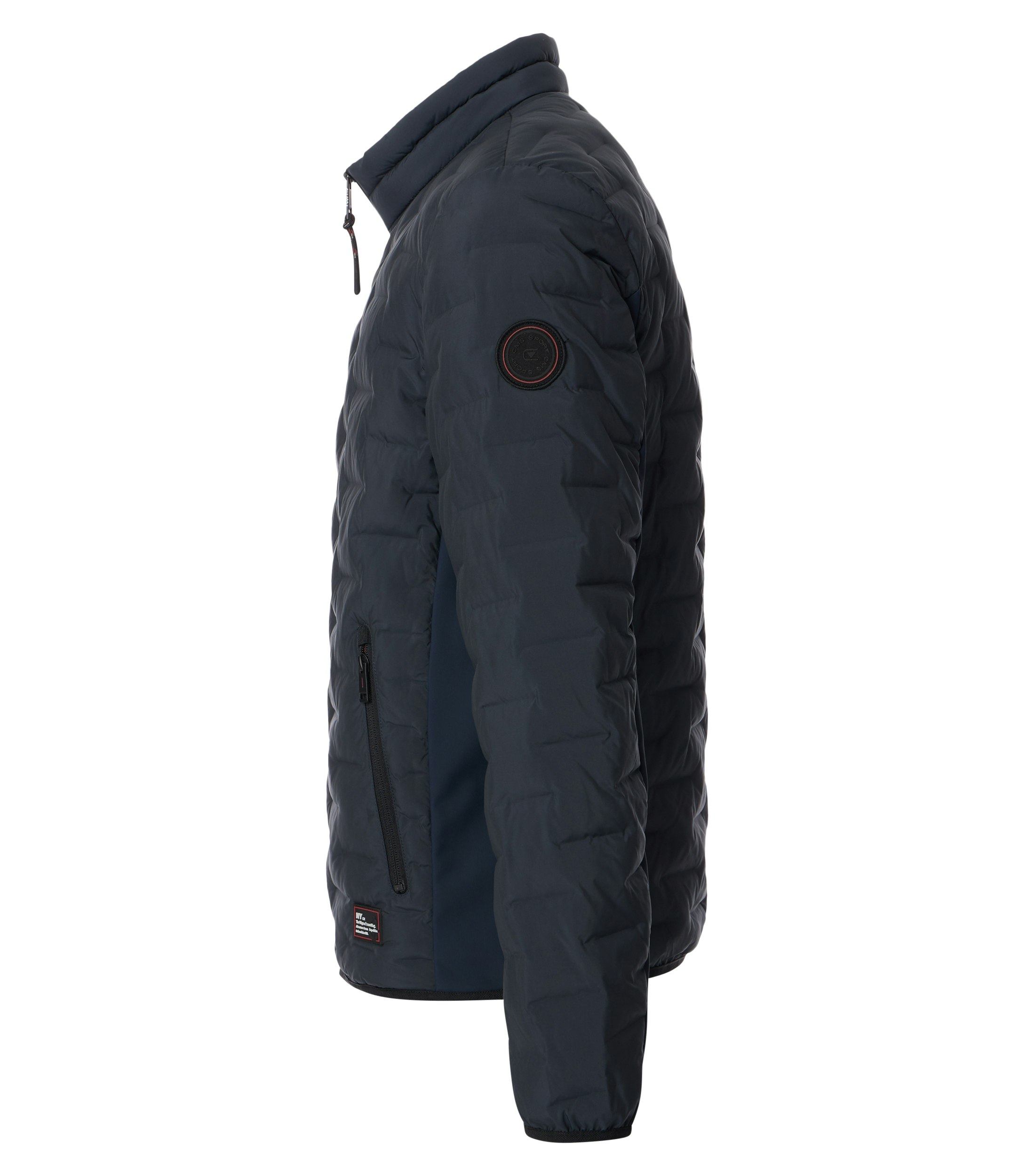 Das Model trägt eine Jacke im uni Muster in der Farbe Dunkelblau