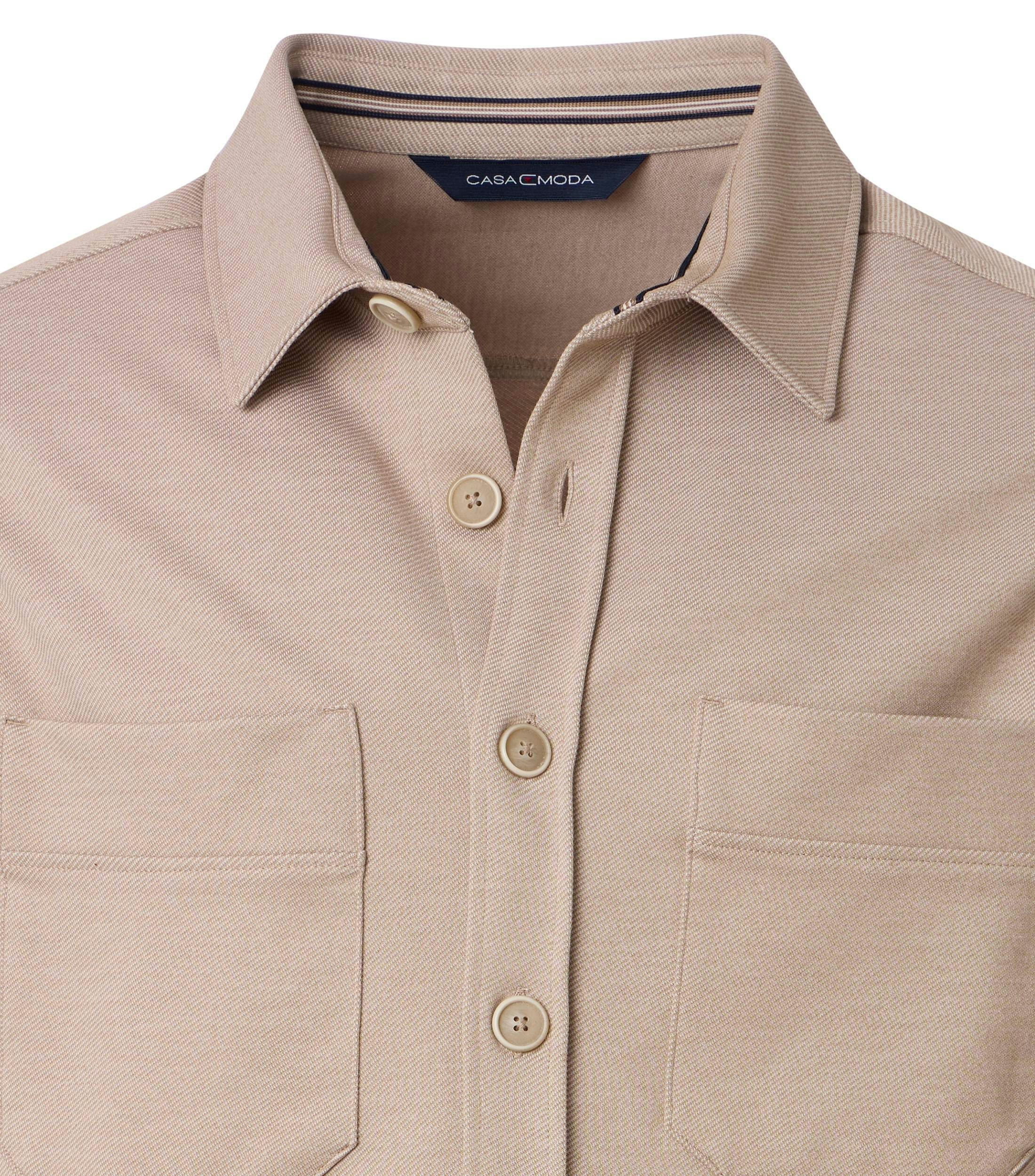 Ein Freizeithemd im uni Muster in der Farbe Beige