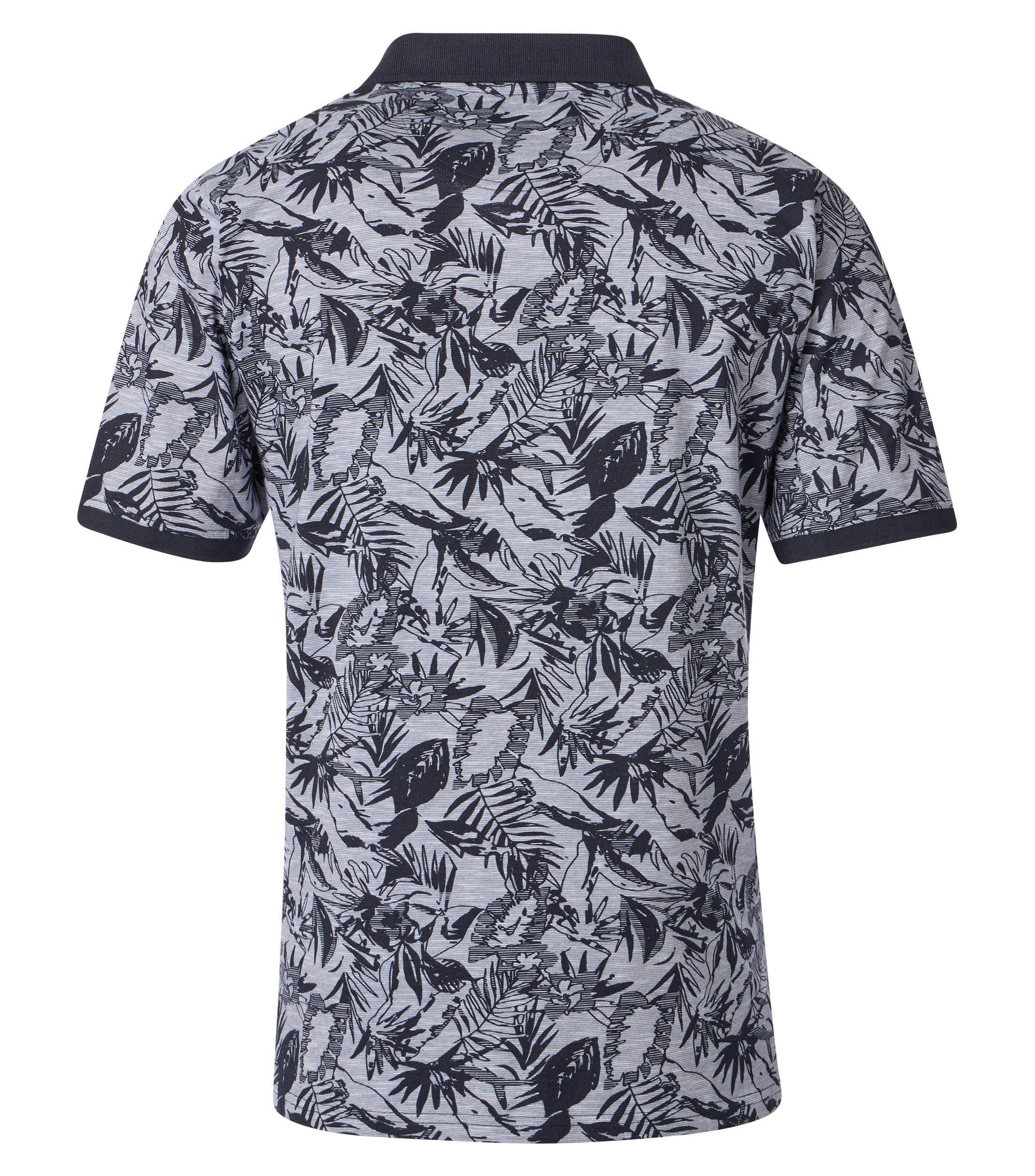 Ein Polo-Shirt im Print Muster in der Farbe Dunkelblau
