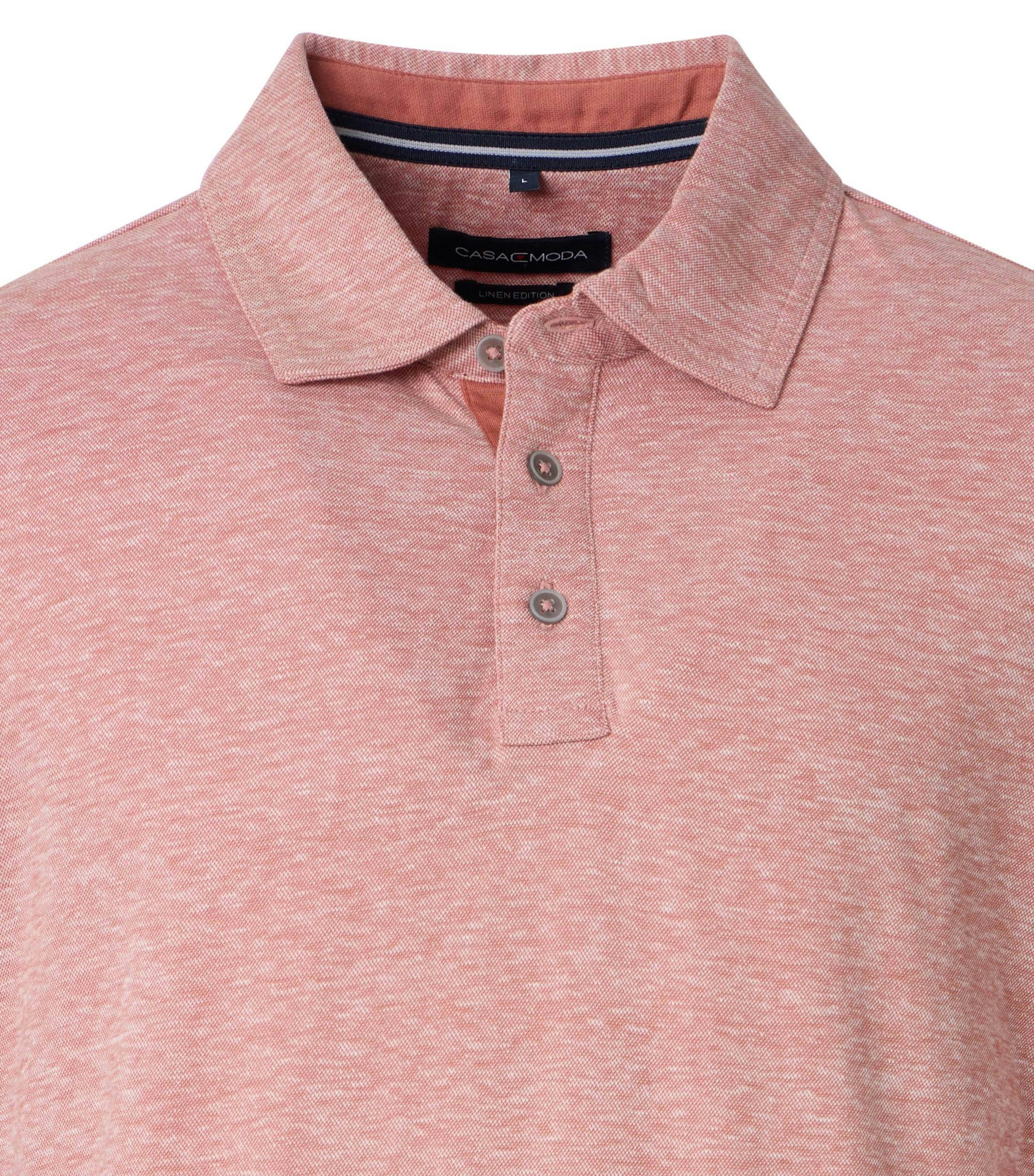 Ein Polo-Shirt im uni Muster in der Farbe Rosarot