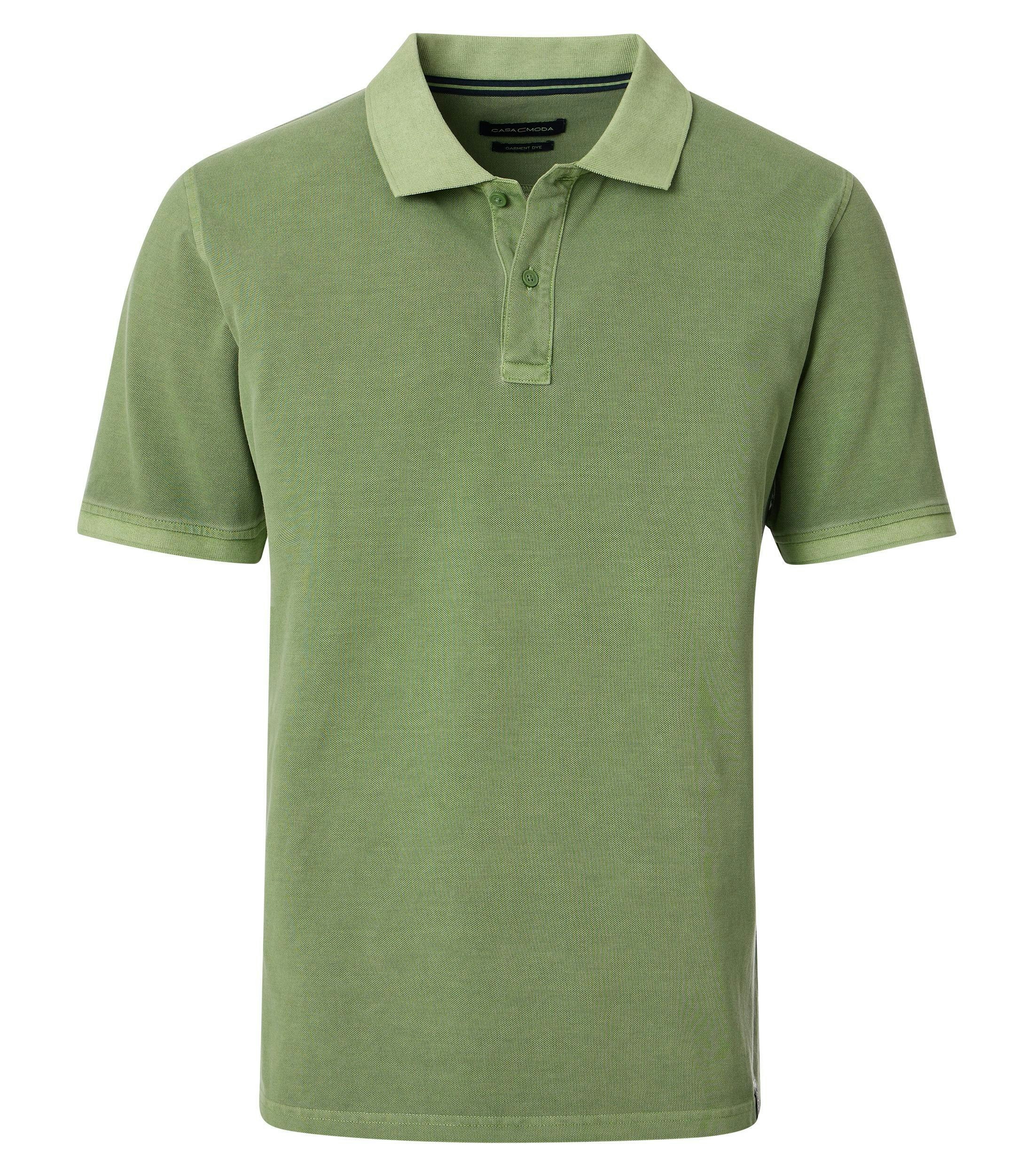 Ein Polo-Shirt im uni Muster in der Farbe Grün