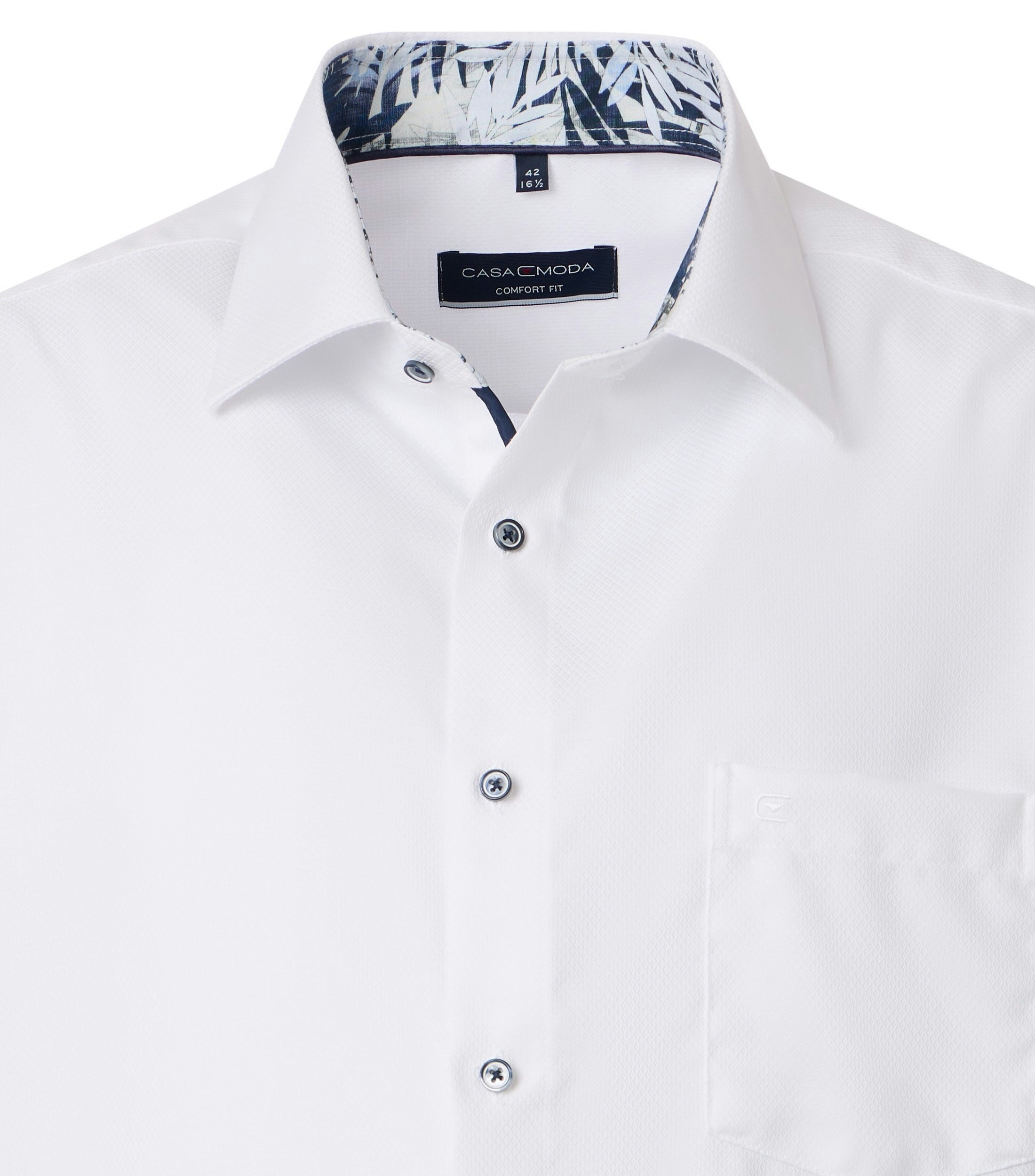 Ein Businesshemd im uni Muster in der Farbe Weiß