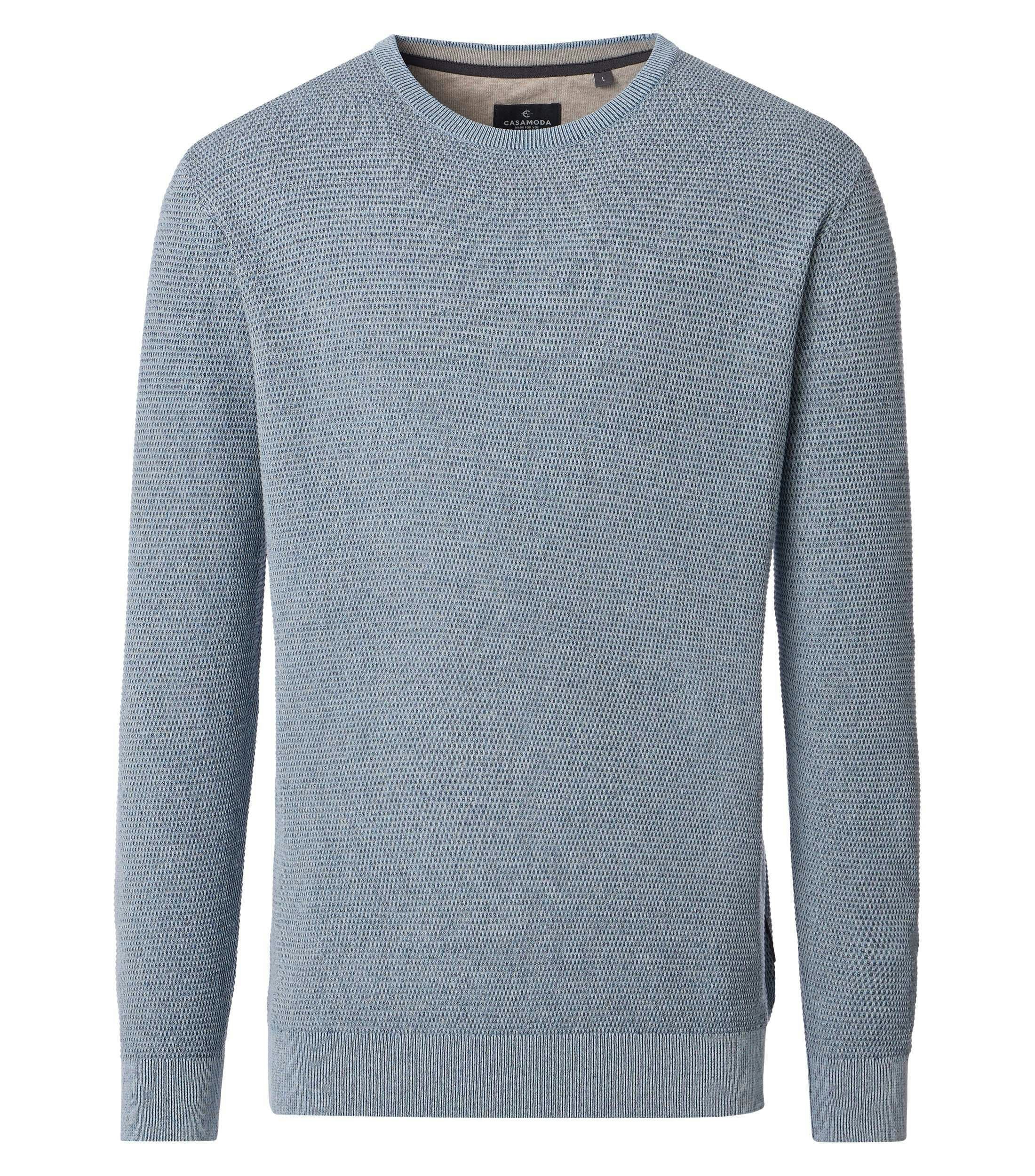 Ein Pullover im uni Muster in der Farbe Himmelblau