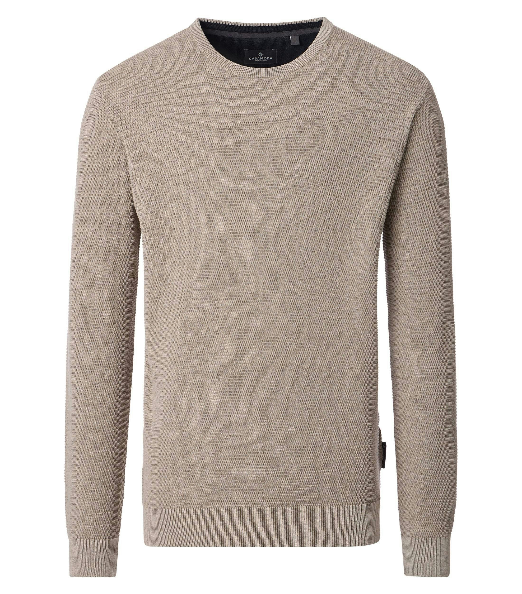 Ein Pullover im uni Muster in der Farbe Beige