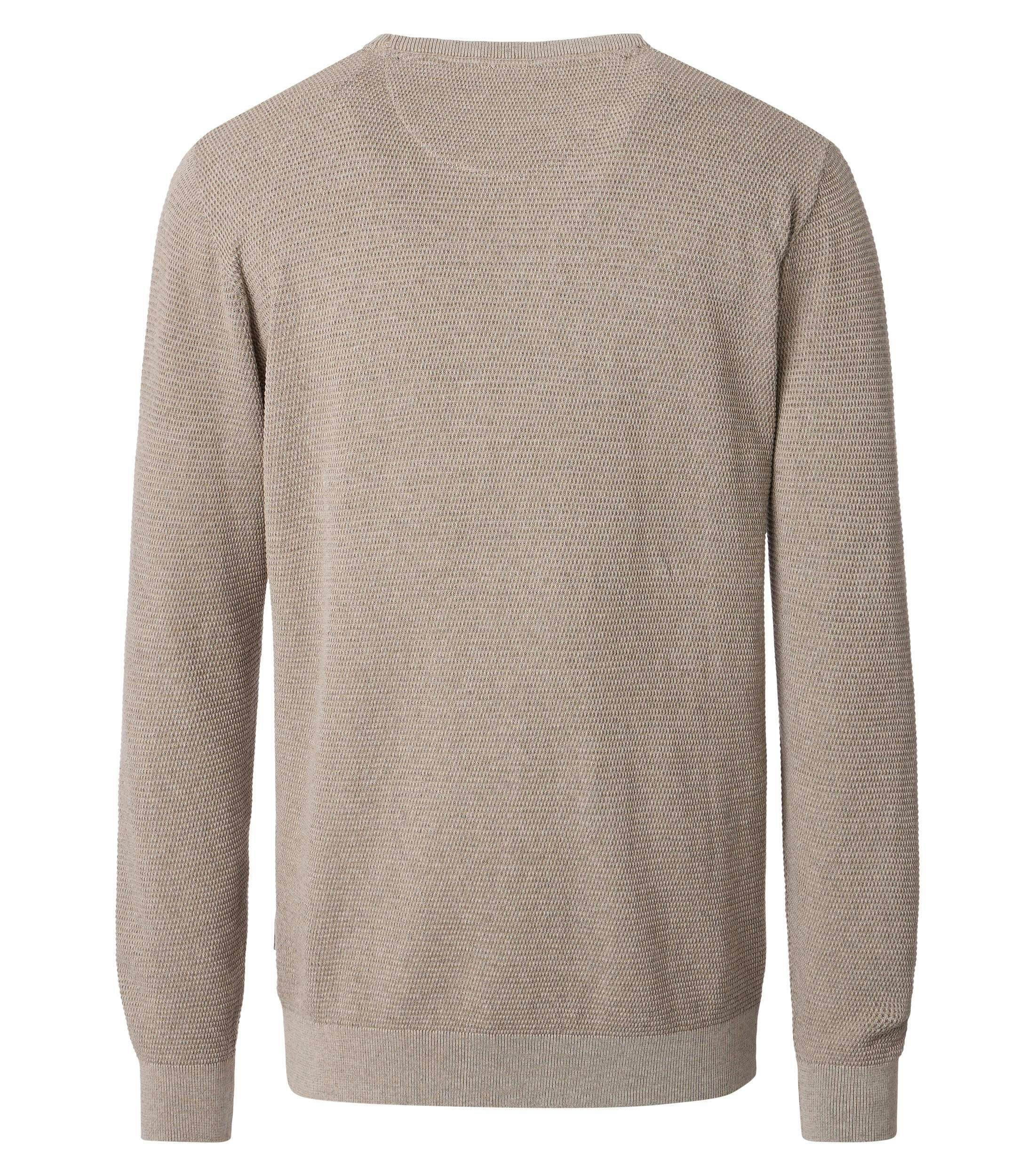 Ein Pullover im uni Muster in der Farbe Beige
