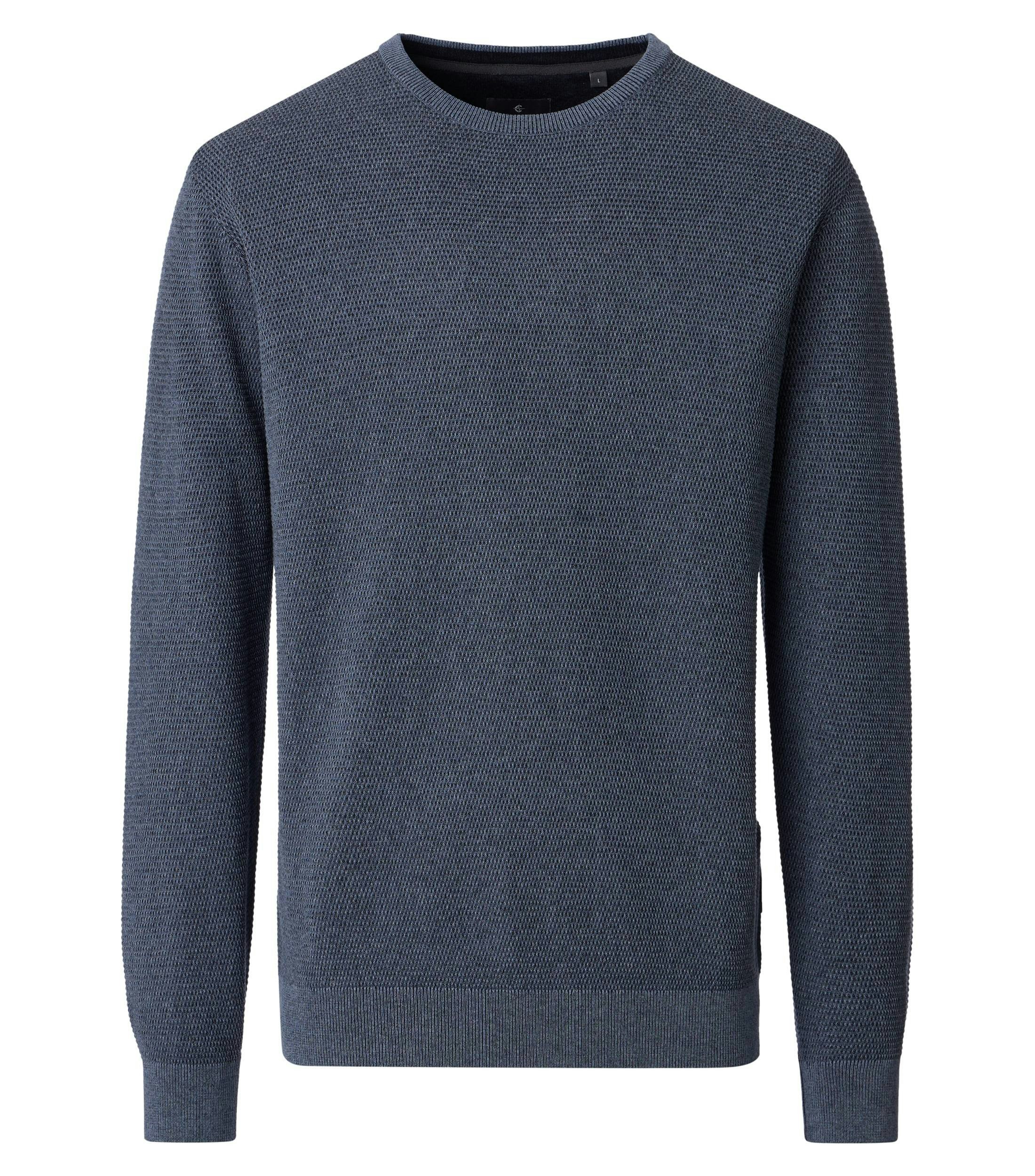 Ein Pullover im uni Muster in der Farbe Blau