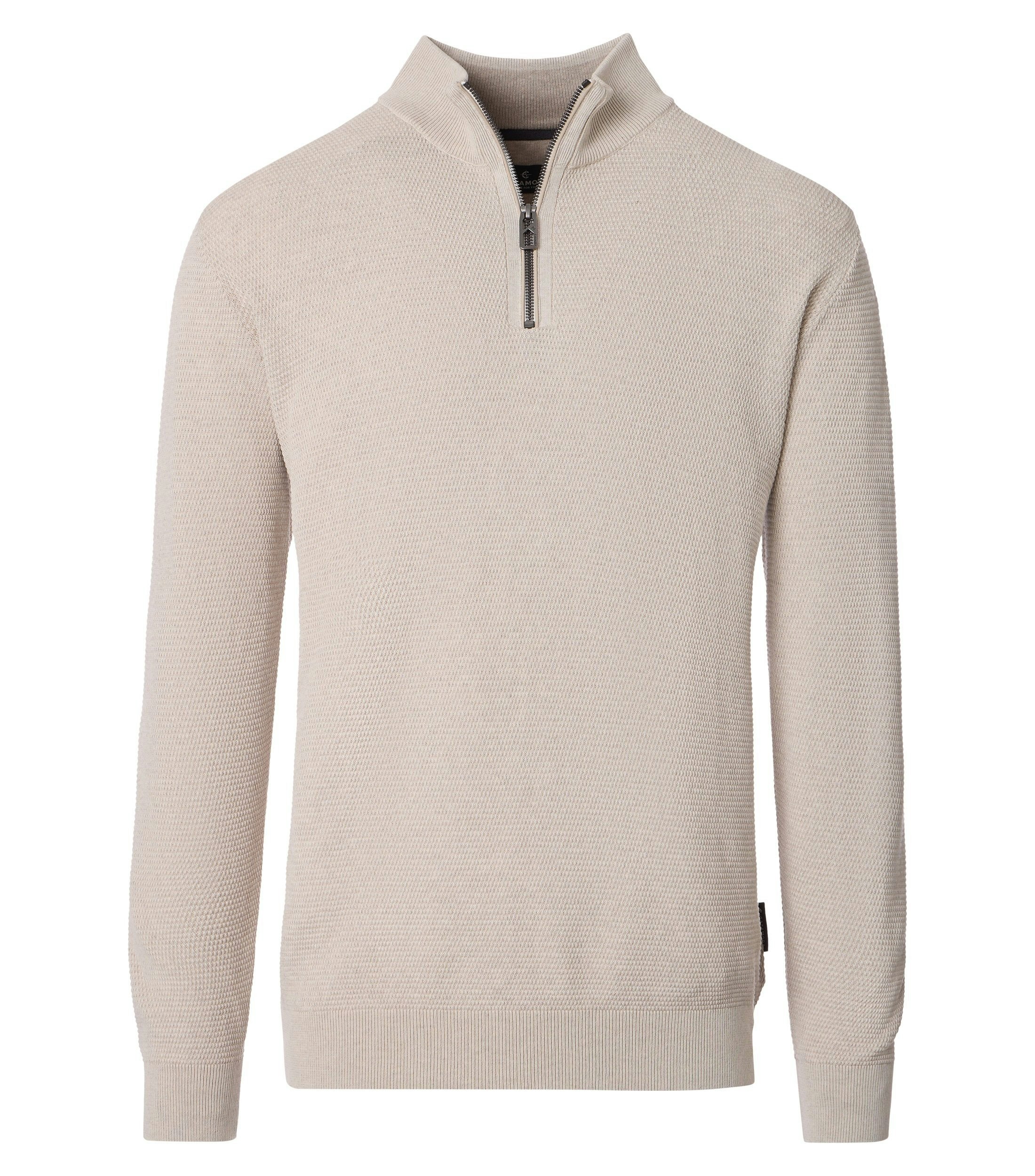 Ein Pullover im uni Muster in der Farbe Weißbeige