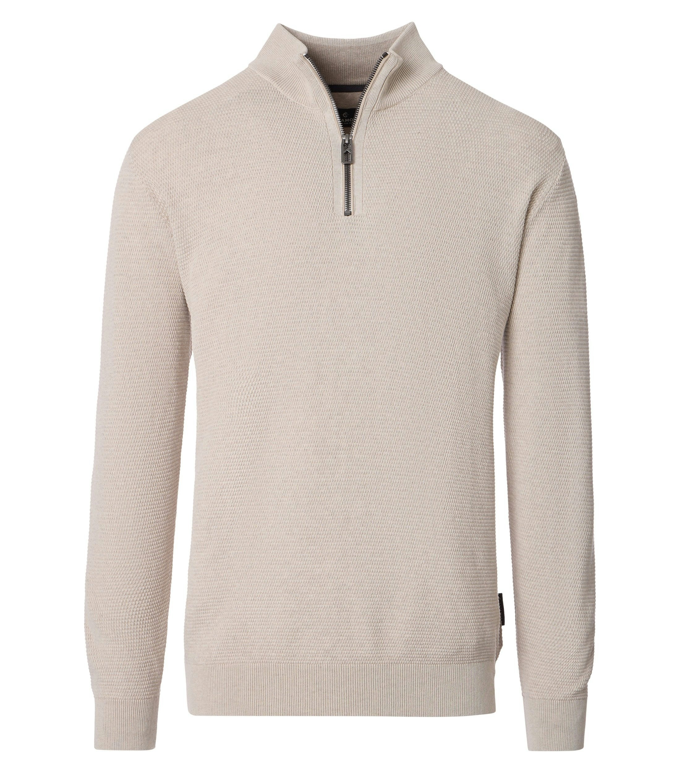 Ein Pullover im uni Muster in der Farbe Weißbeige