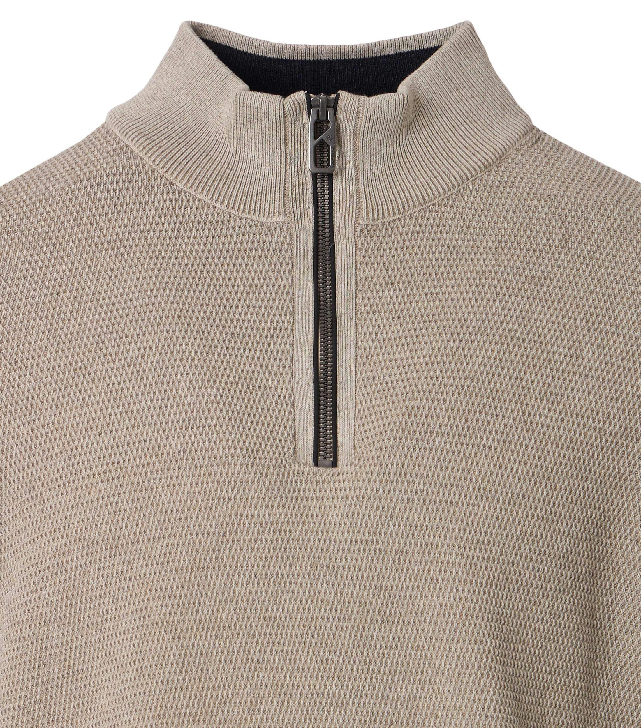 Ein Pullover im uni Muster in der Farbe Beige