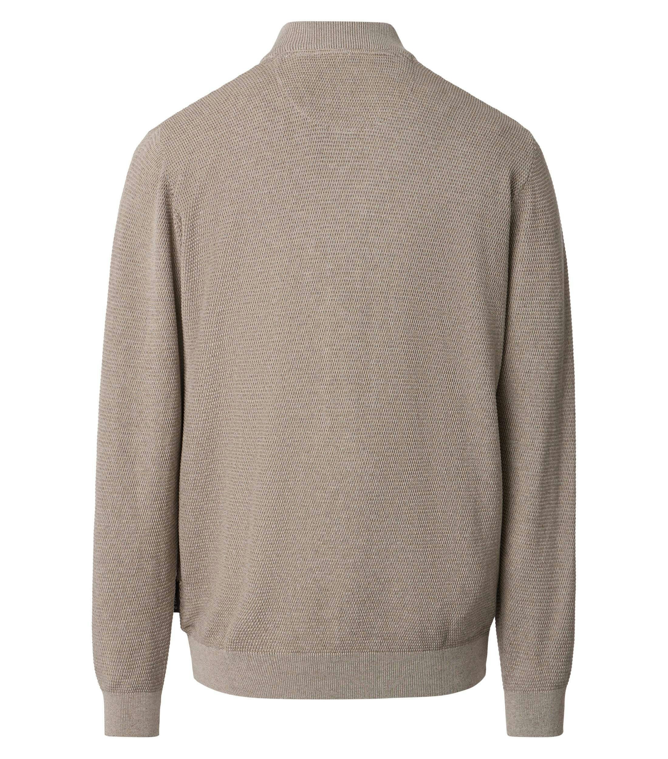 Eine Strickjacke im uni Muster in der Farbe Beige