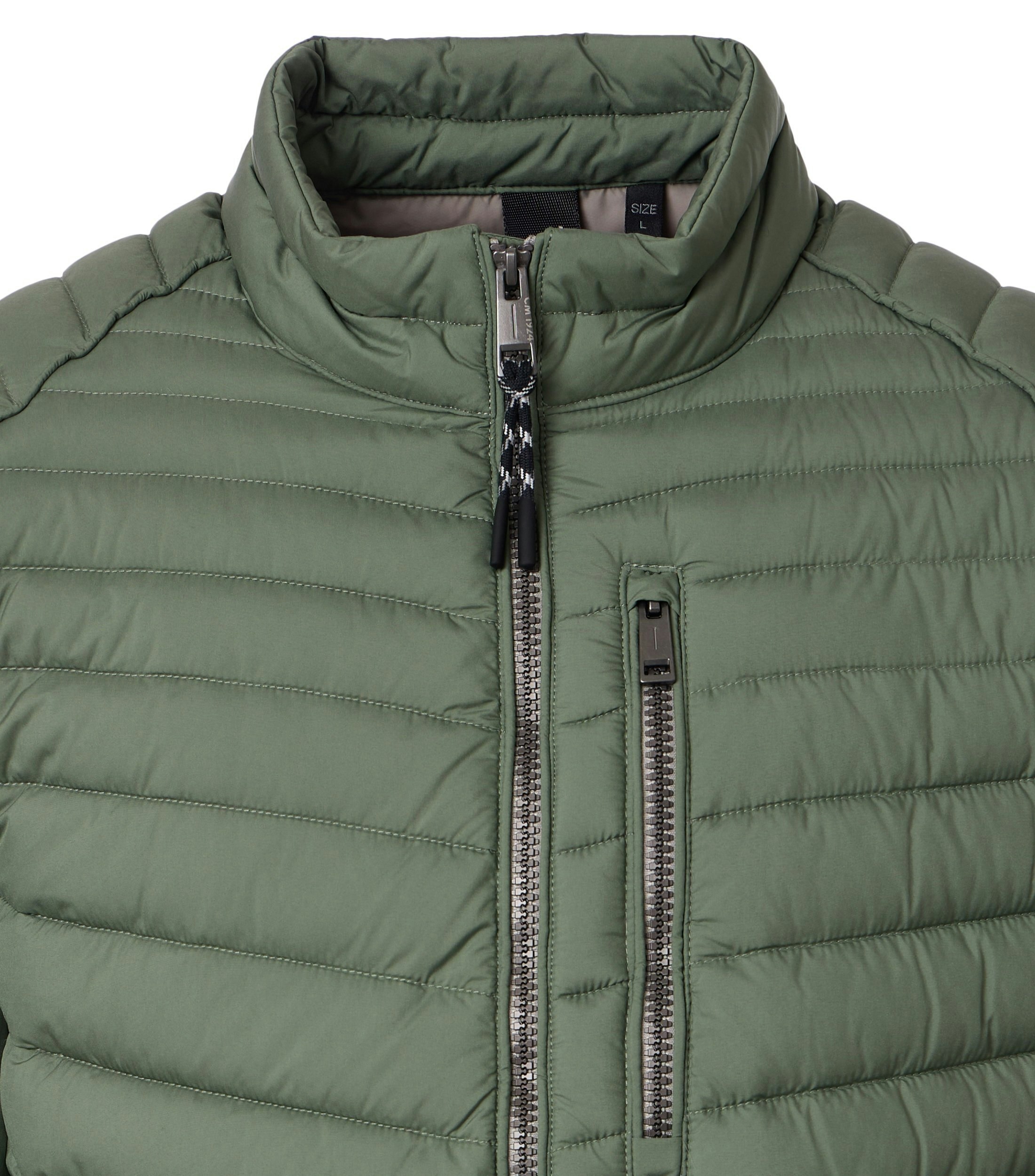 Eine Jacke im uni Muster in der Farbe Türkis