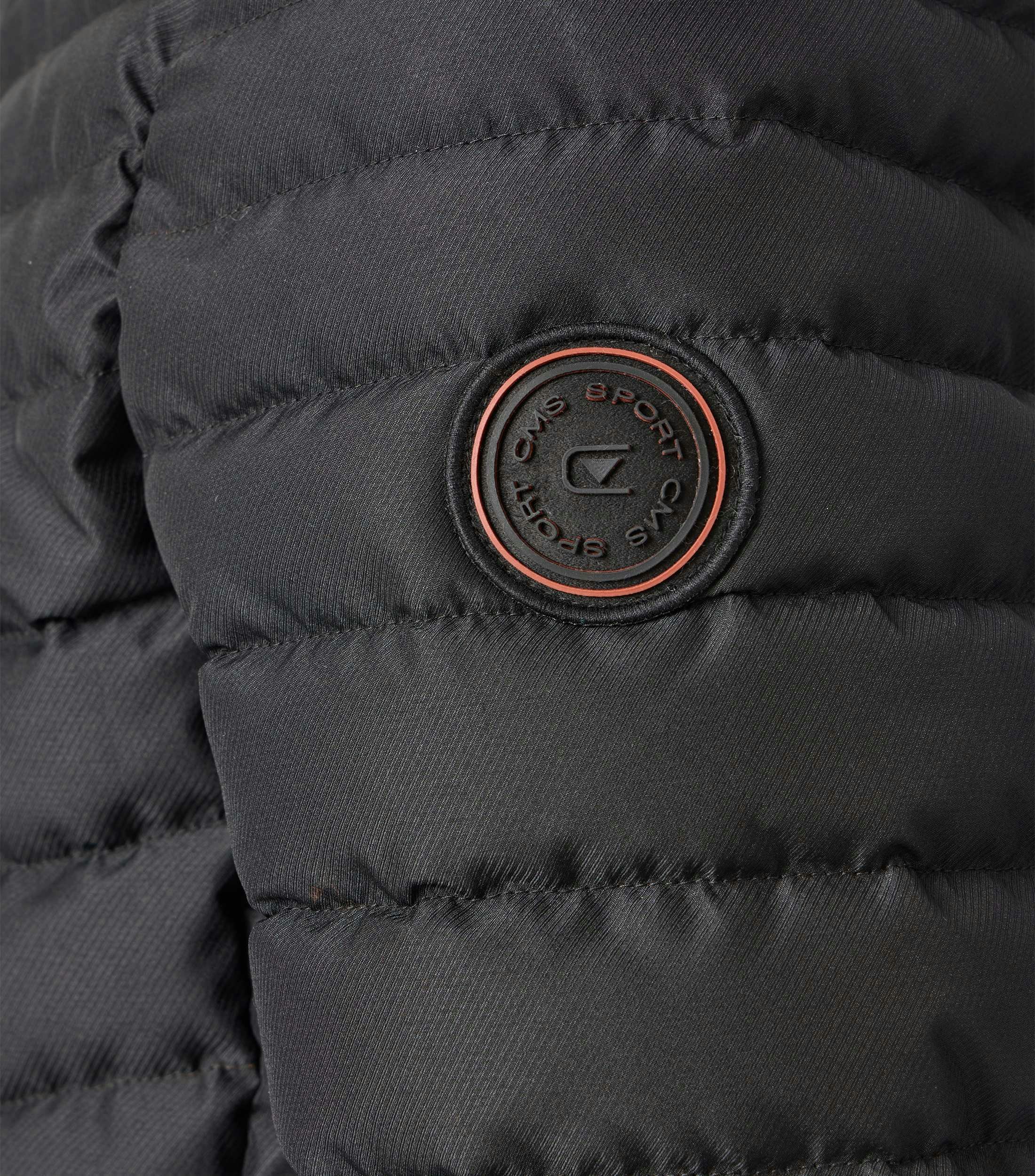 Eine Jacke im uni Muster in der Farbe Grauschwarz