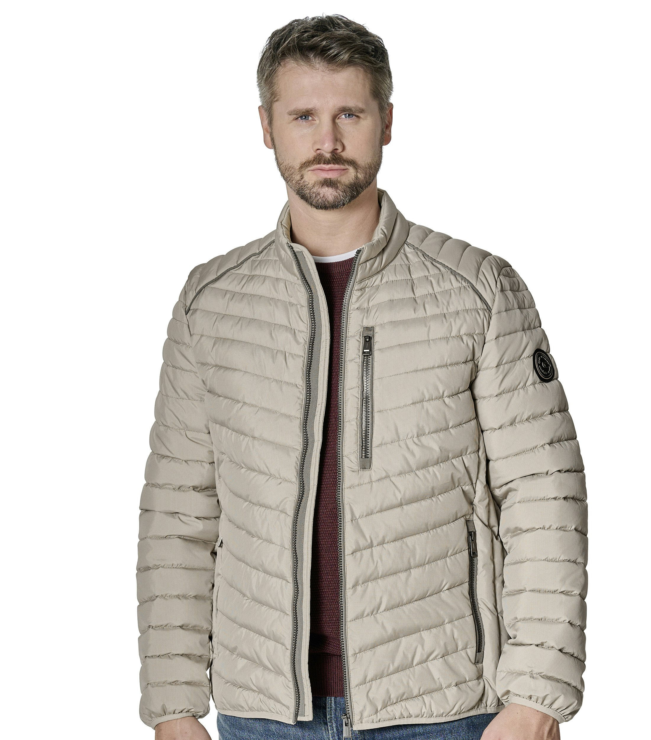 Eine Jacke im uni Muster in der Farbe Champagner Beige