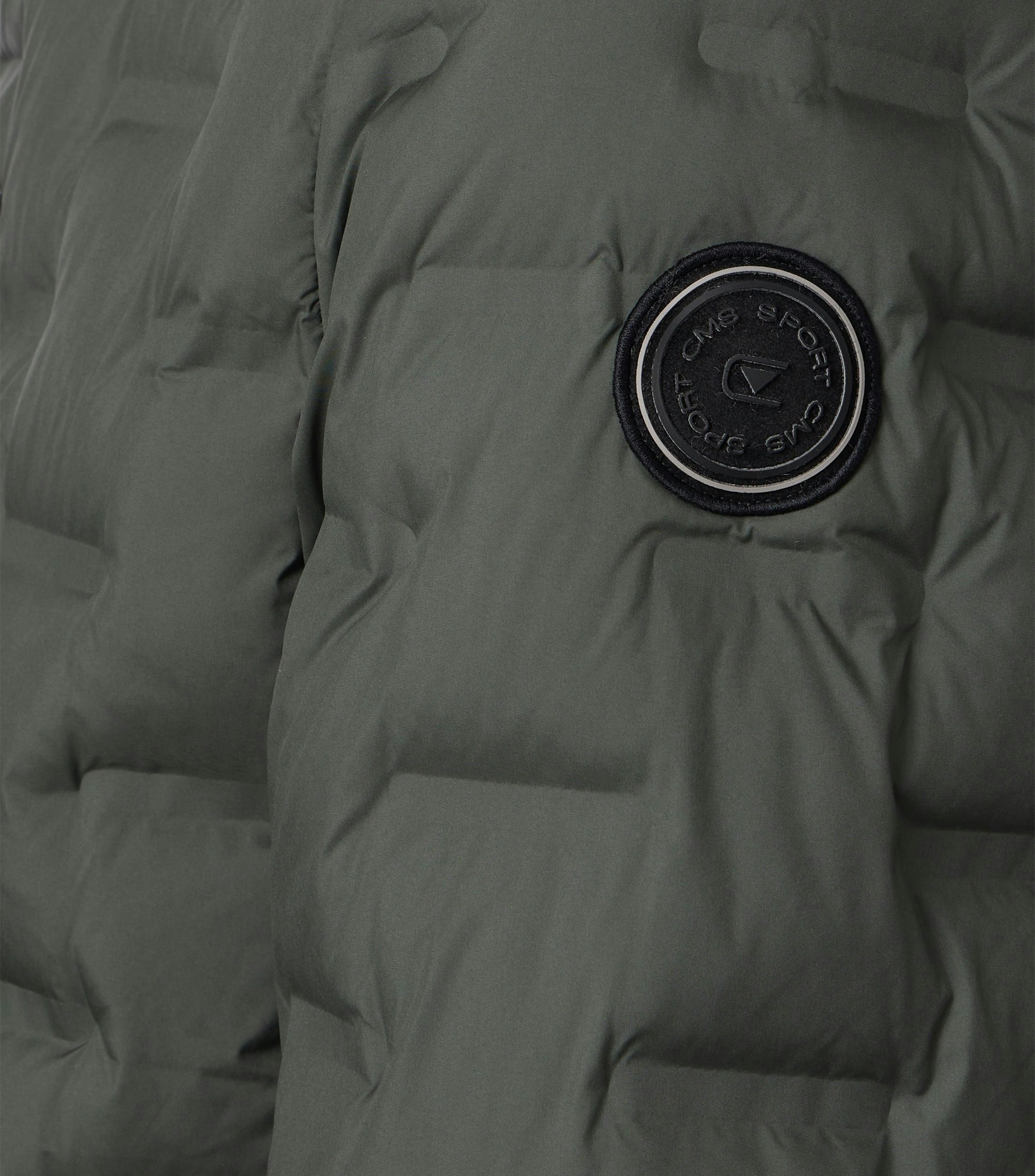 Eine Jacke im uni Muster in der Farbe Dunkelgrün