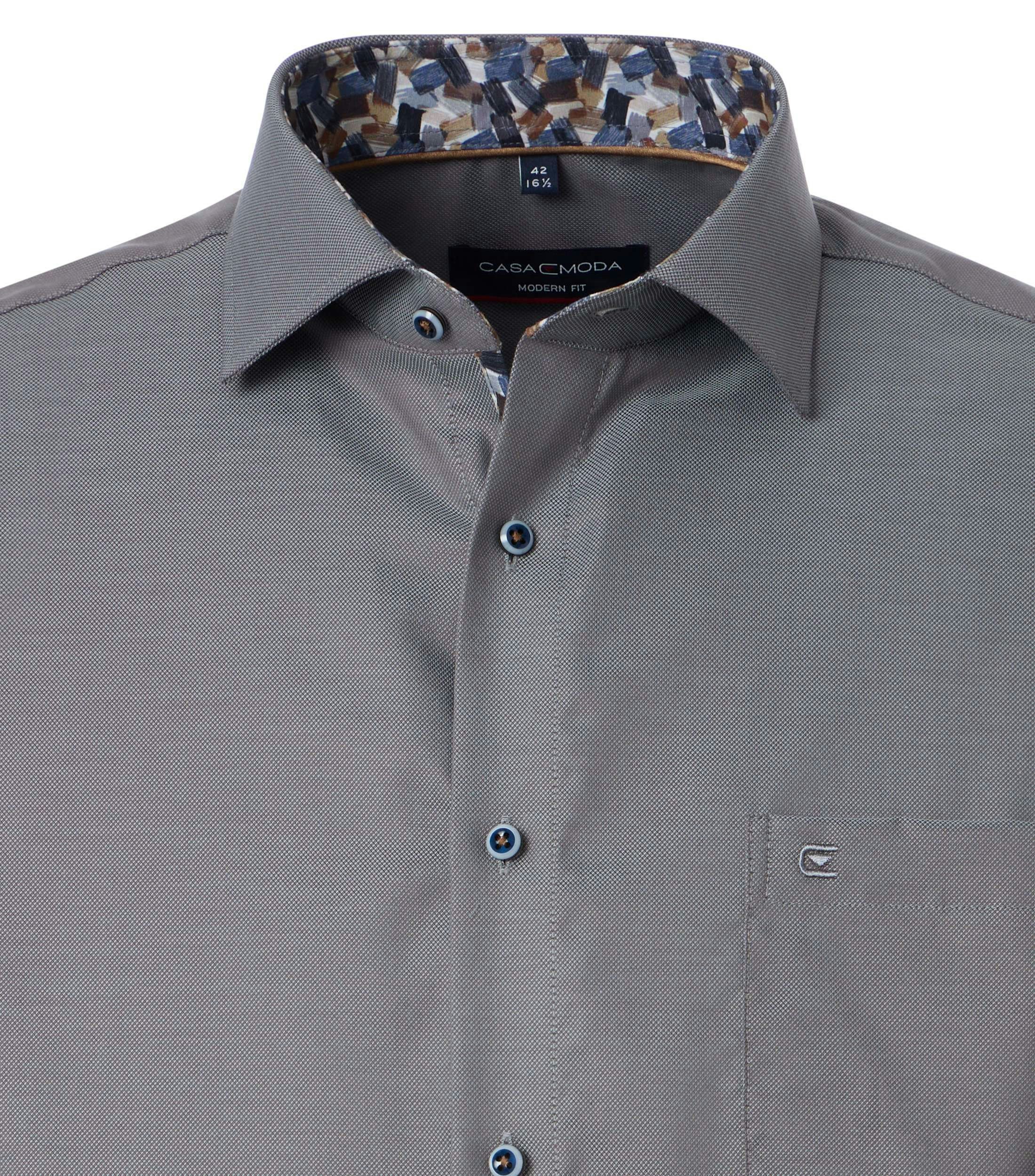 Ein Businesshemd im uni Muster in der Farbe Dunkelgrün