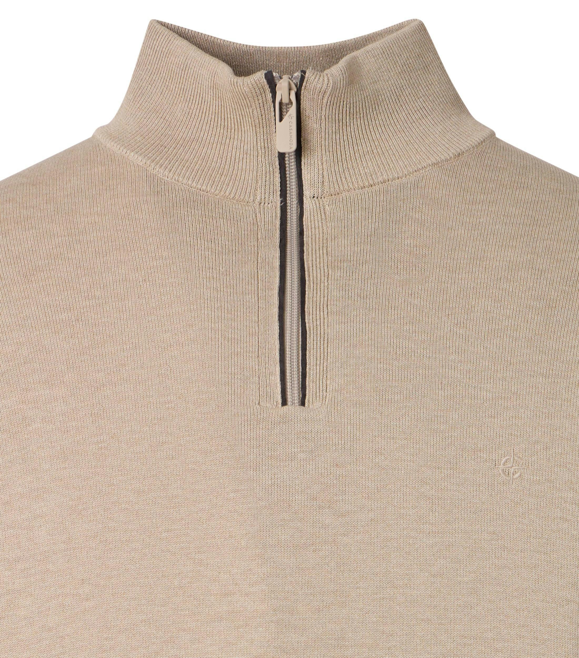 Ein Pullover im uni Muster in der Farbe Beige