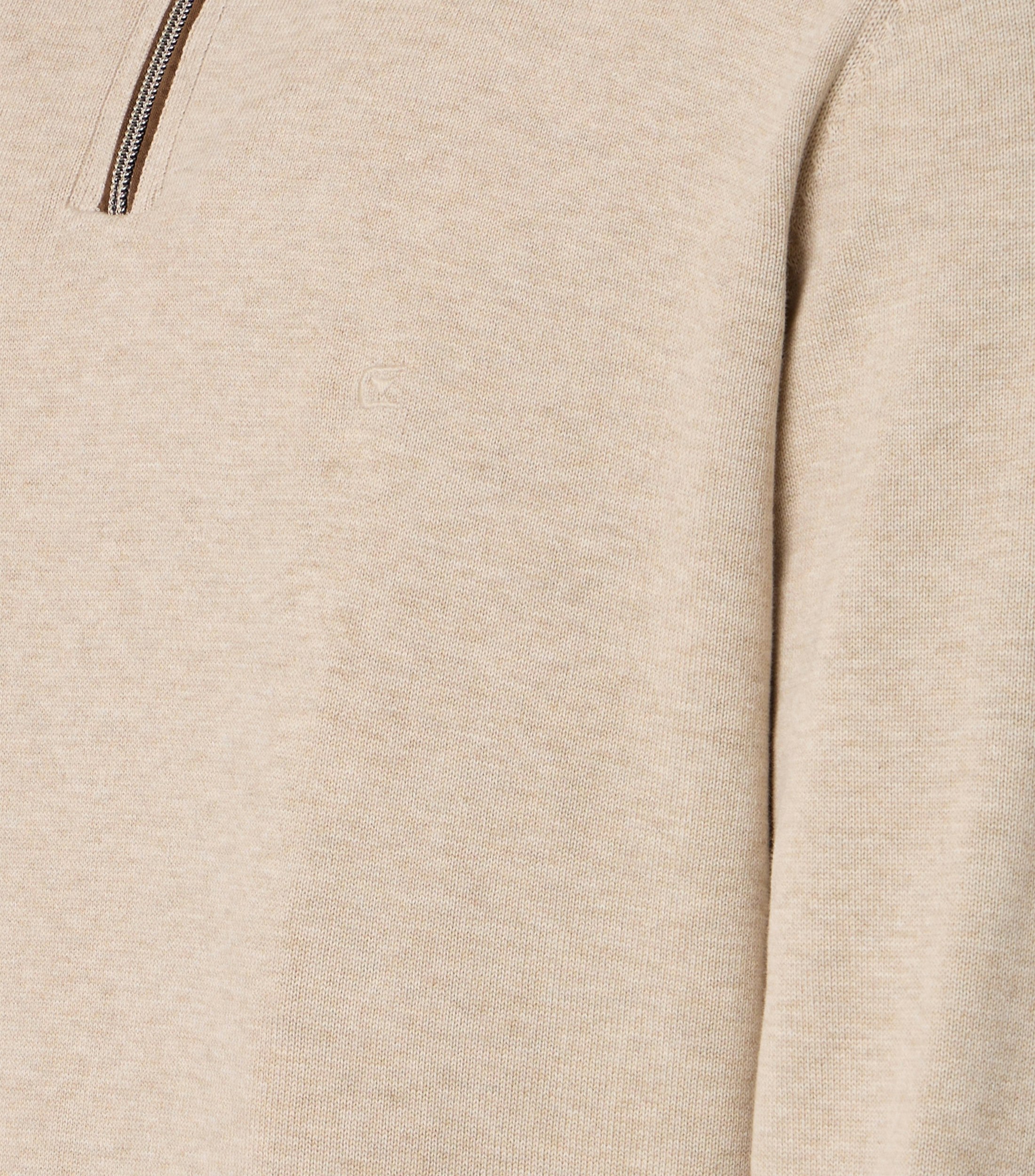 Ein Pullover im uni Muster in der Farbe Beige