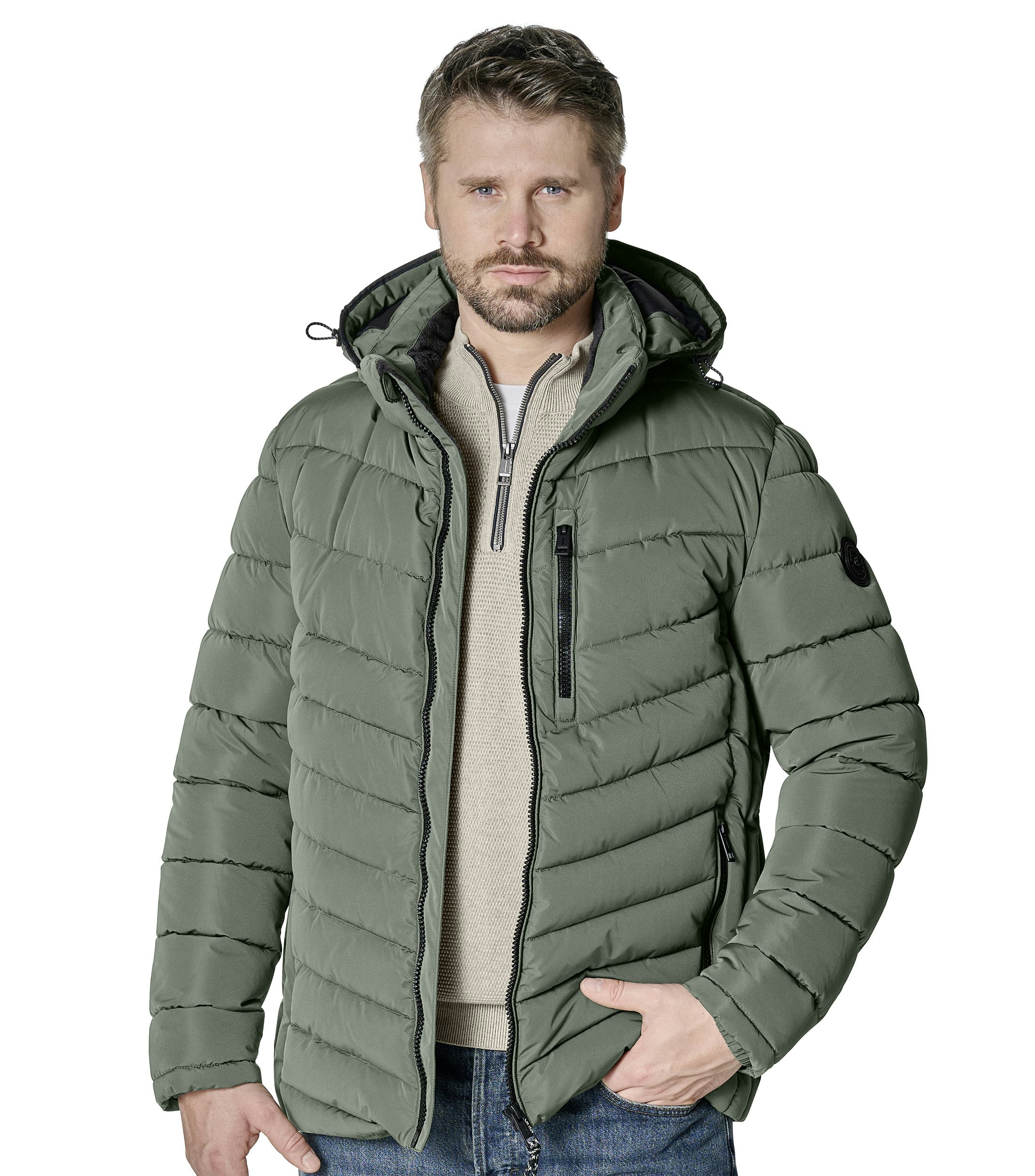 Eine Jacke im uni Muster in der Farbe Grün