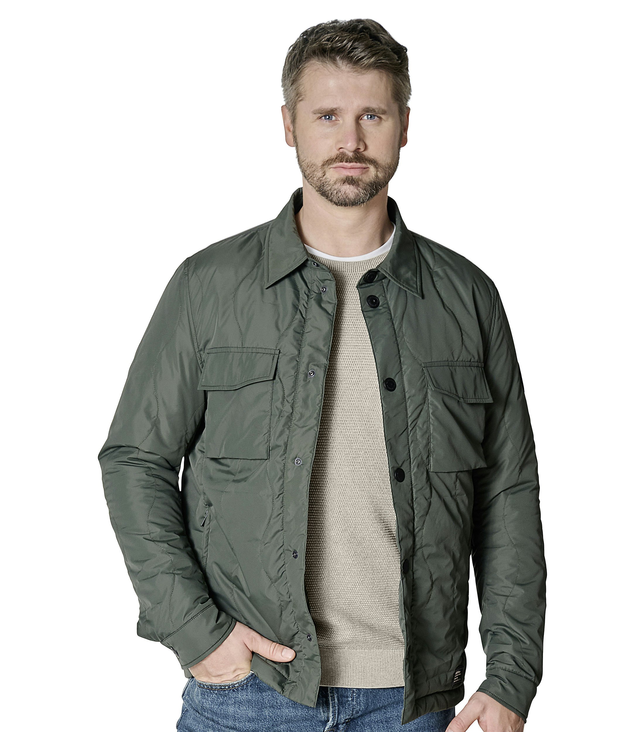 Eine Jacke im uni Muster in der Farbe Grün